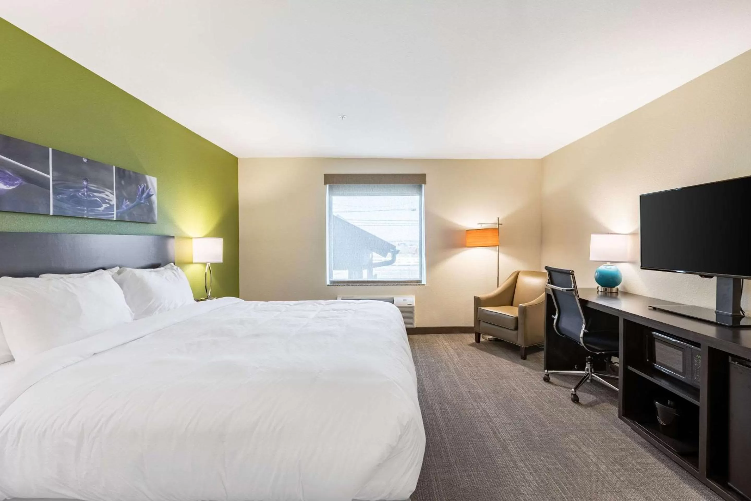 Photo of the whole room, Bed in Sleep Inn & Suites Mt Hope near Auction & Event Center