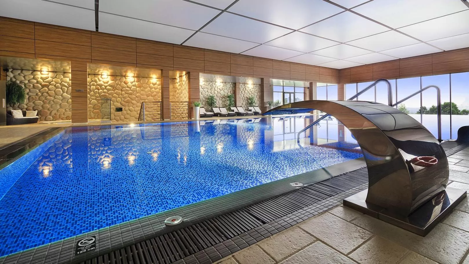 Swimming pool in Odyssey ClubHotel Wellness & SPA Adults Only