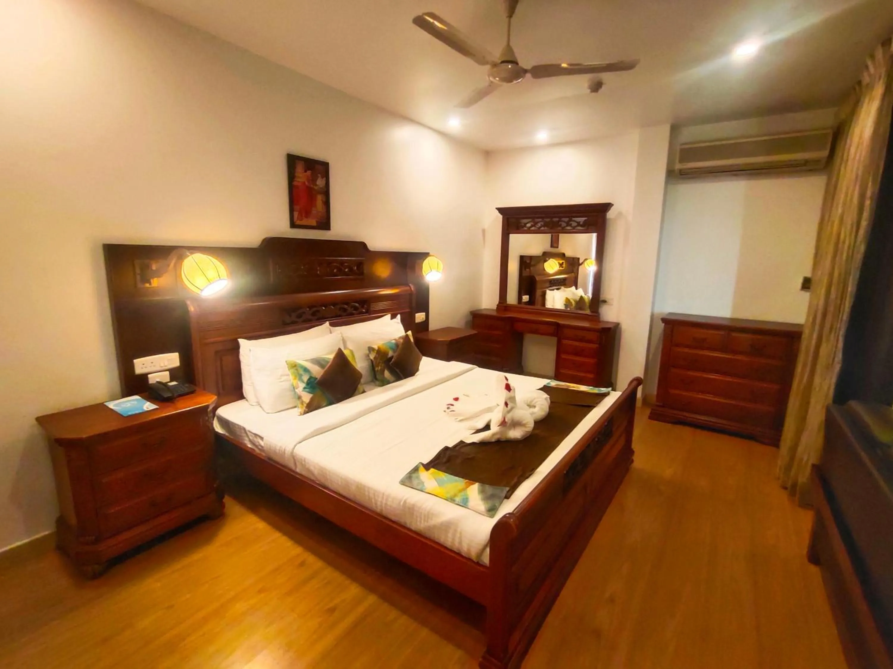 Bed in The Travancore Heritage Beach Resort