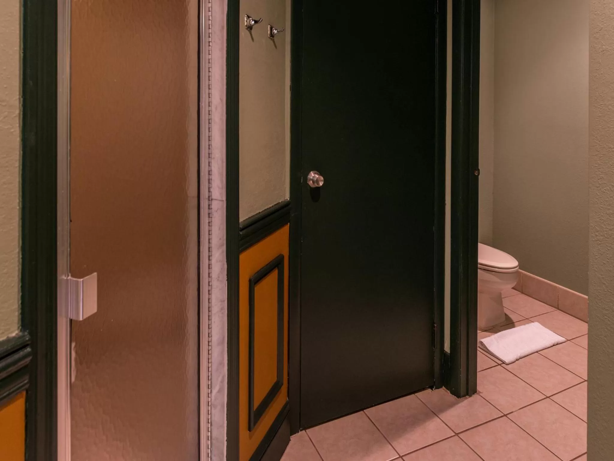 Toilet in Inn of The Dove Romantic Luxury & Business Suites