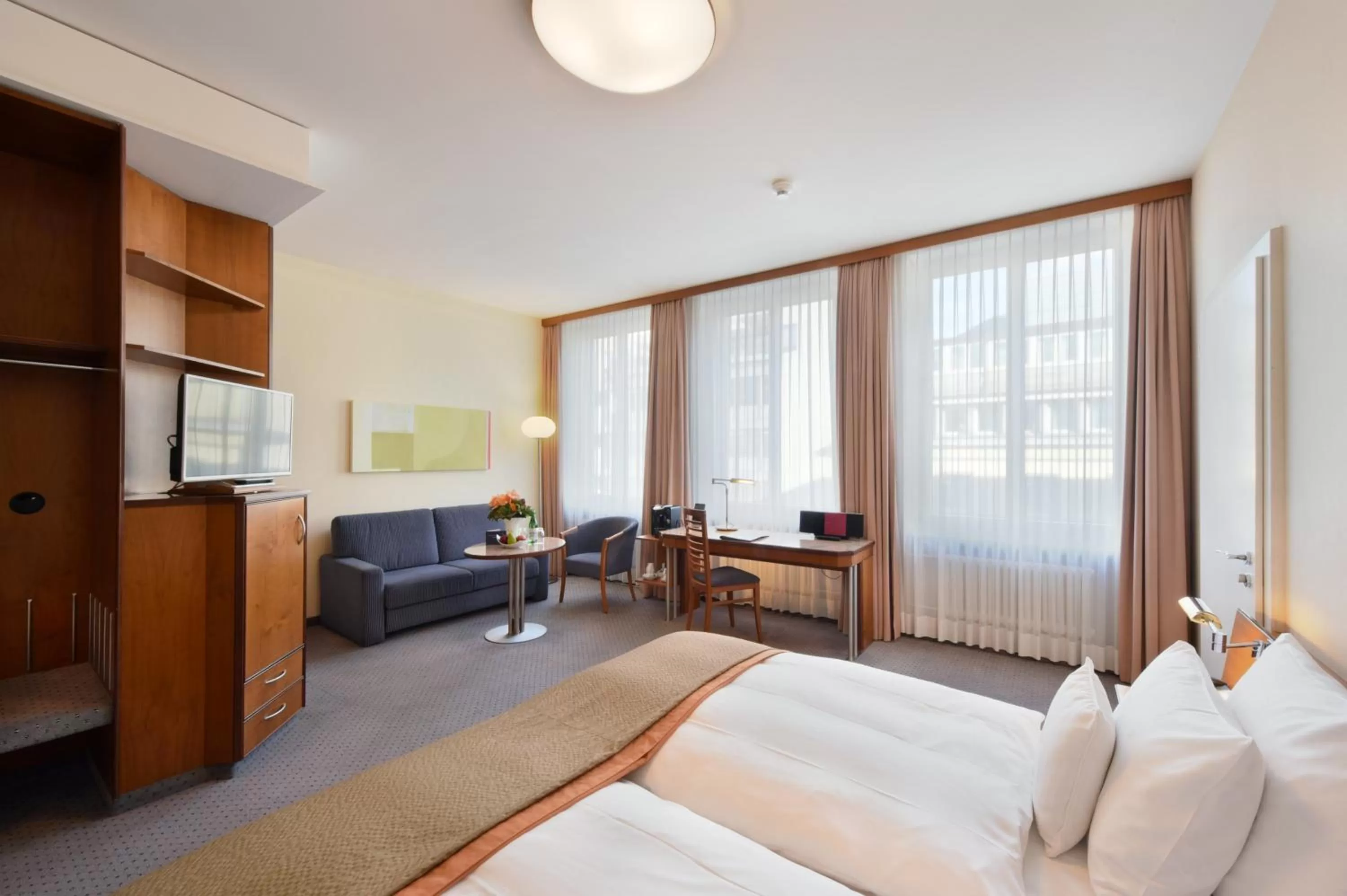 Photo of the whole room, Bed in Glärnischhof by TRINITY