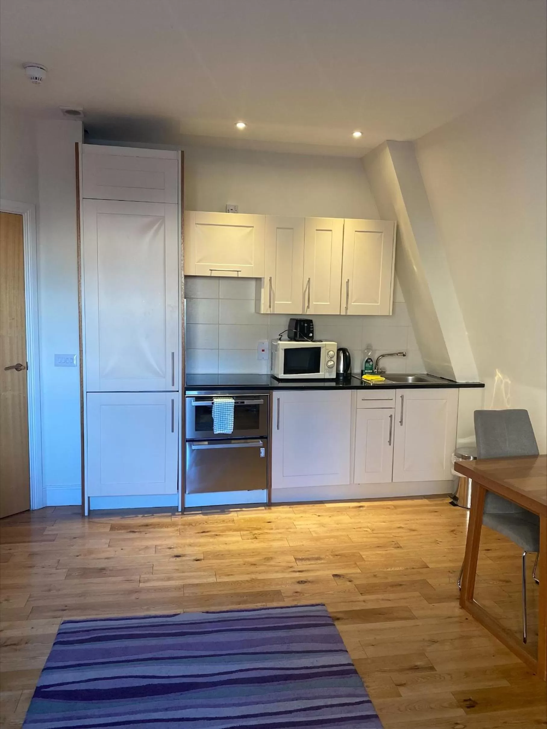 Kitchen or kitchenette in Royal Athenaeum Suites