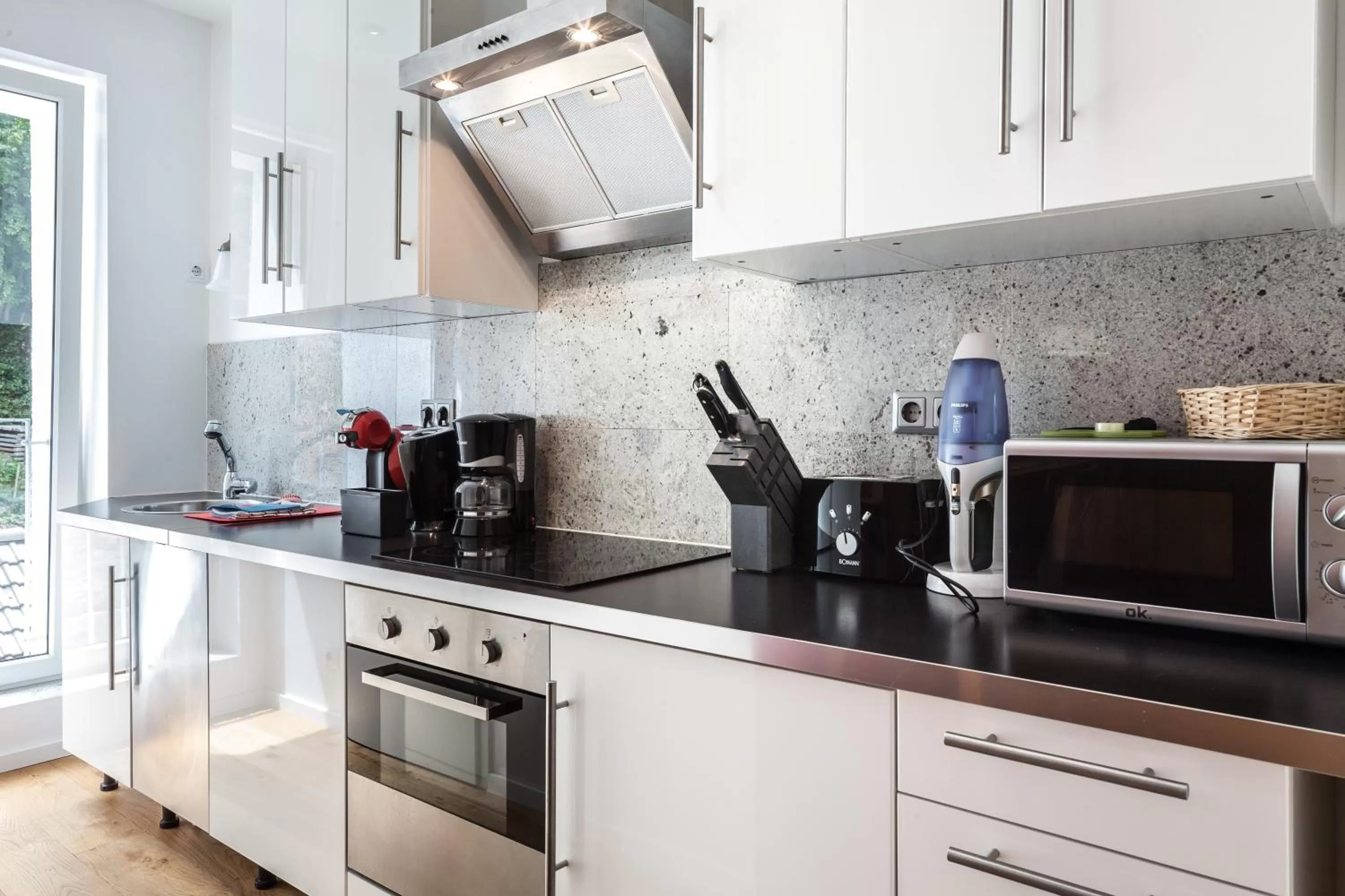 Kitchen or kitchenette in GL Suites