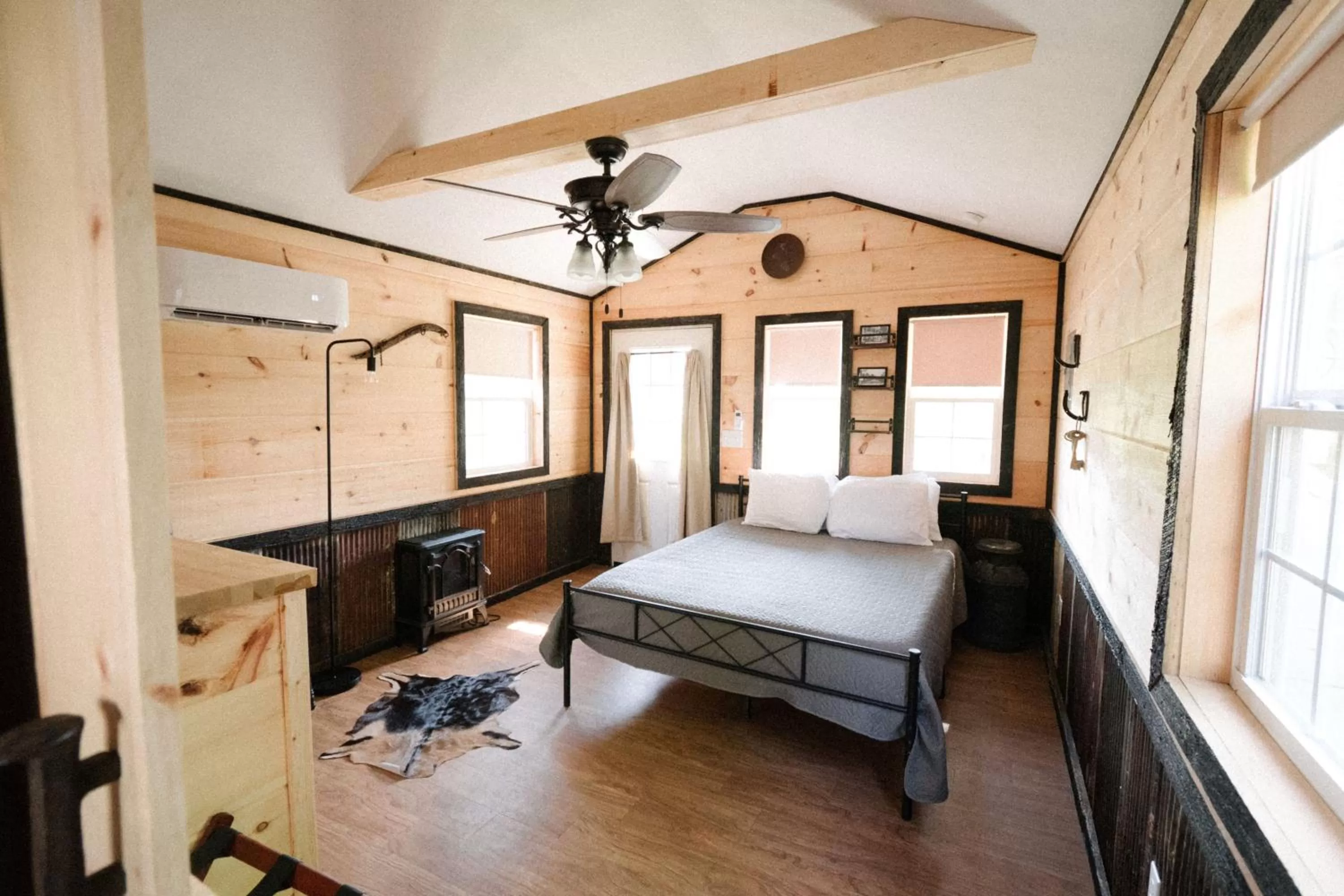 Photo of the whole room, Bed in The Outpost