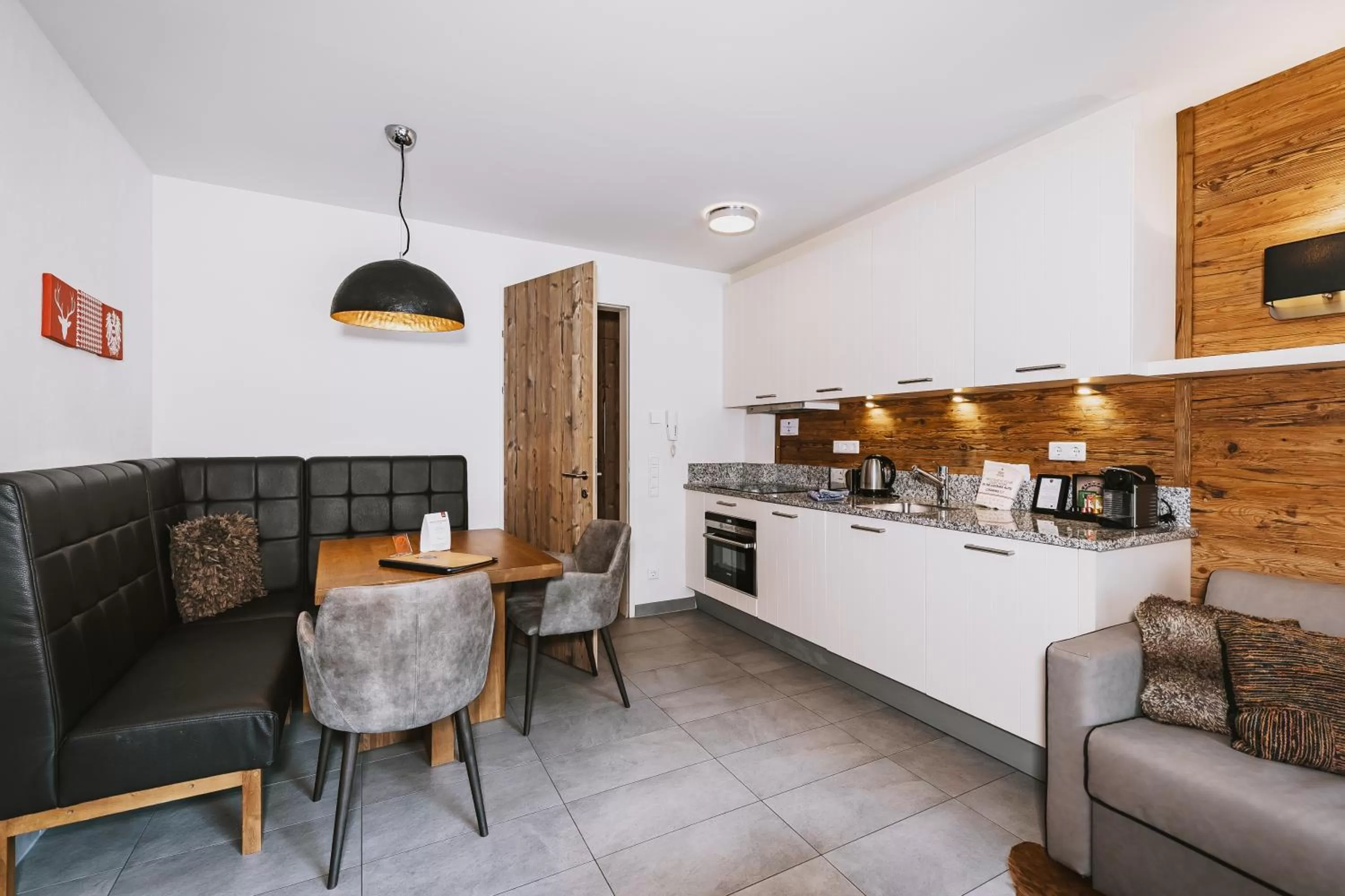 Kitchen or kitchenette in AvenidA Mountain Lodges Kaprun