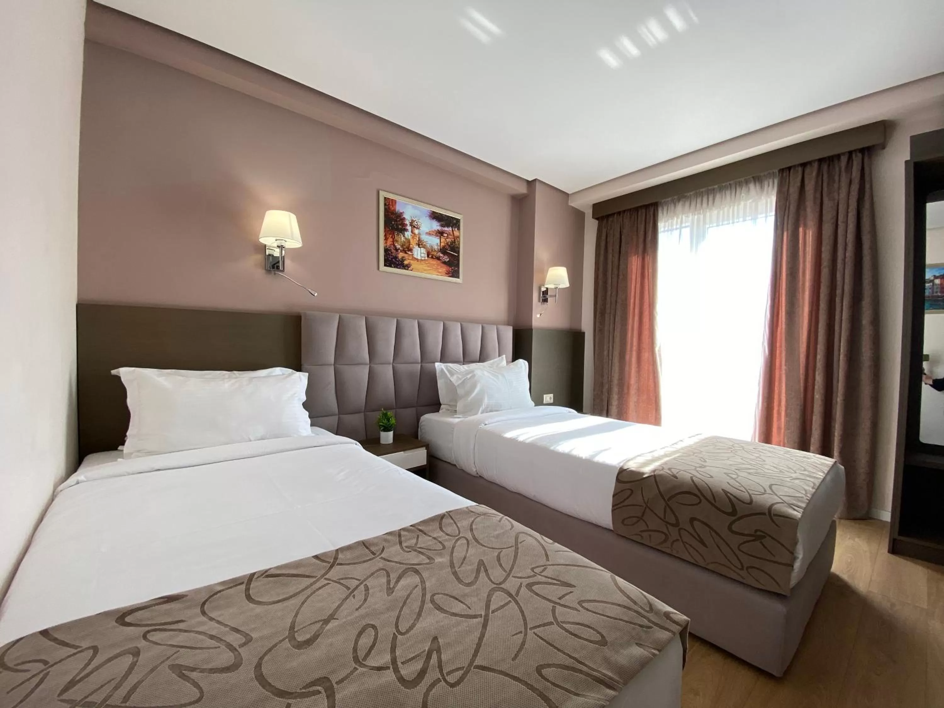 Bed in Doanesia Premium Hotel & Spa