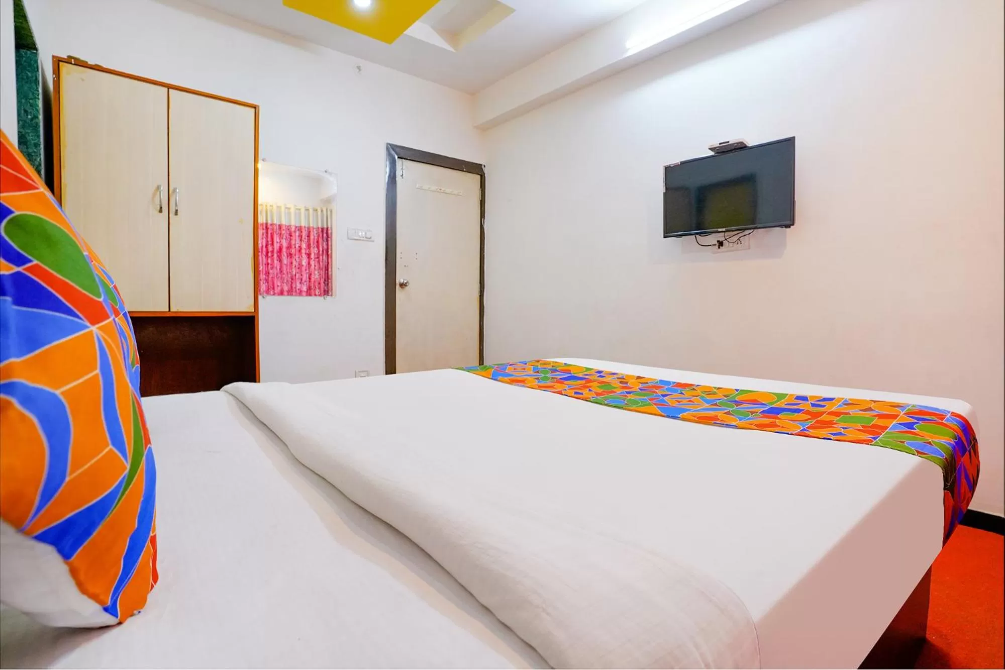 Bed in FabHotel Sai Chatra