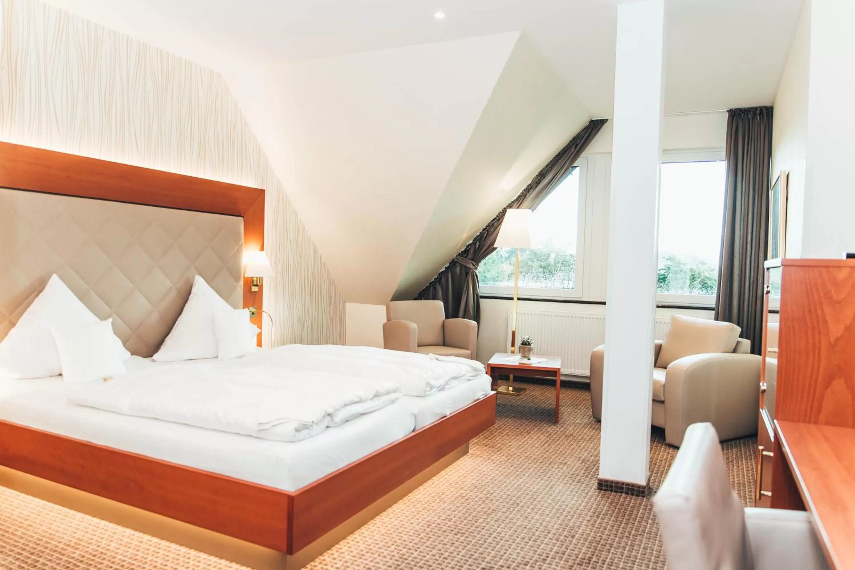 Photo of the whole room, Bed in Ringhotel Teutoburger Wald