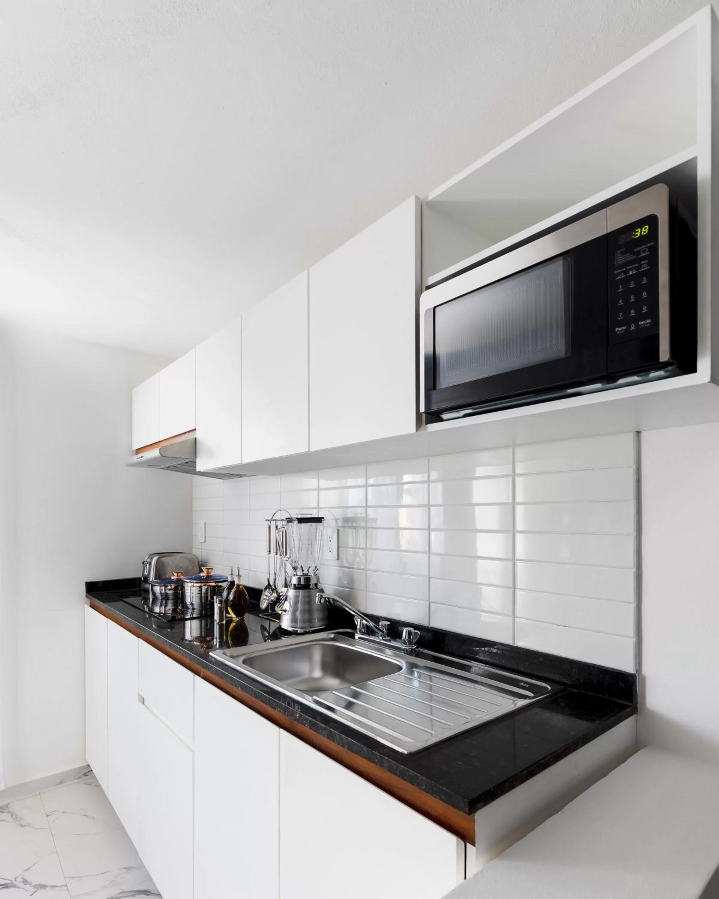 Kitchen or kitchenette in Seven Boutique Apartments Cancún