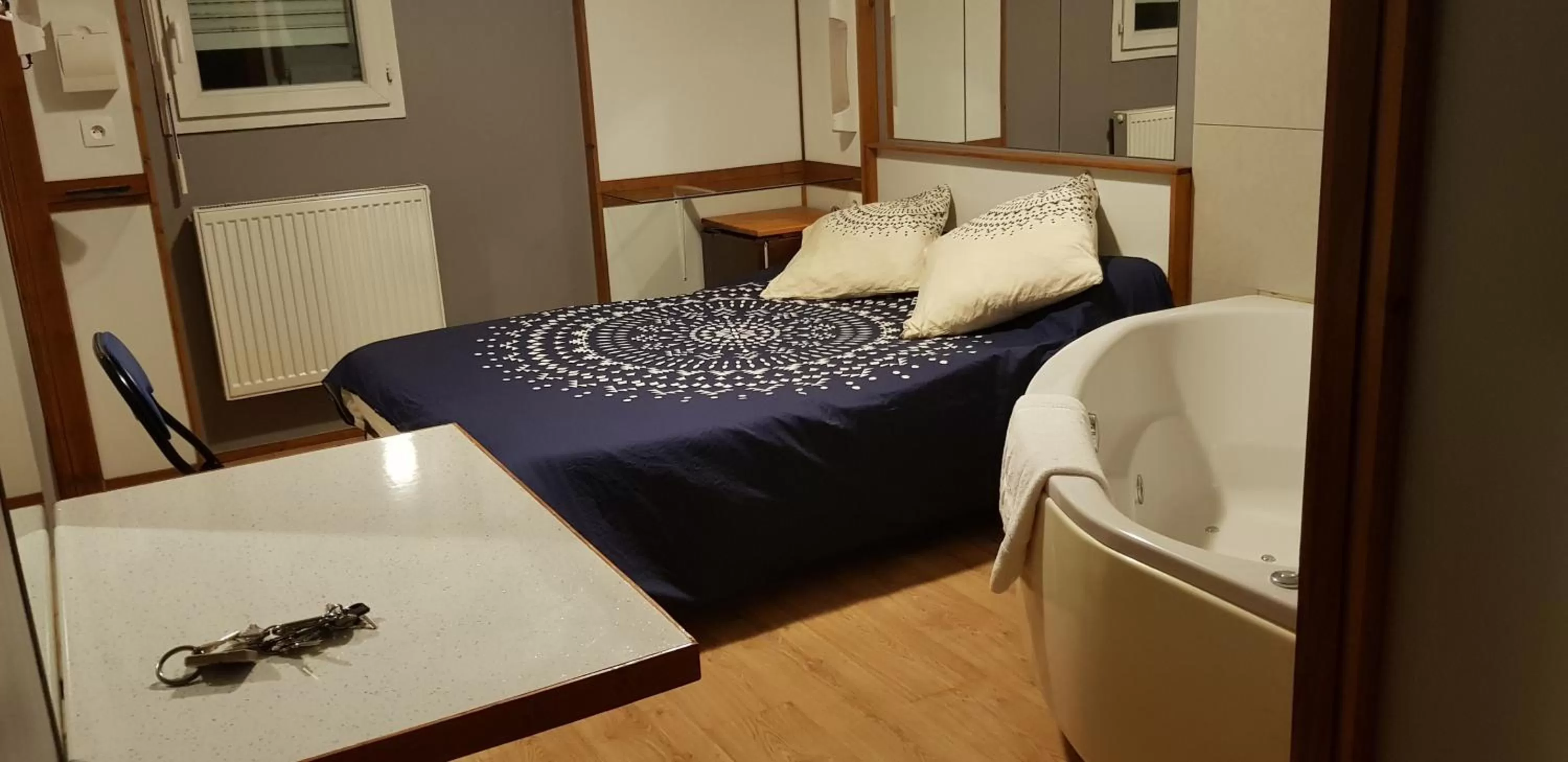 Photo of the whole room, Bed in Hôtel Eco Logis Espace Bellevue