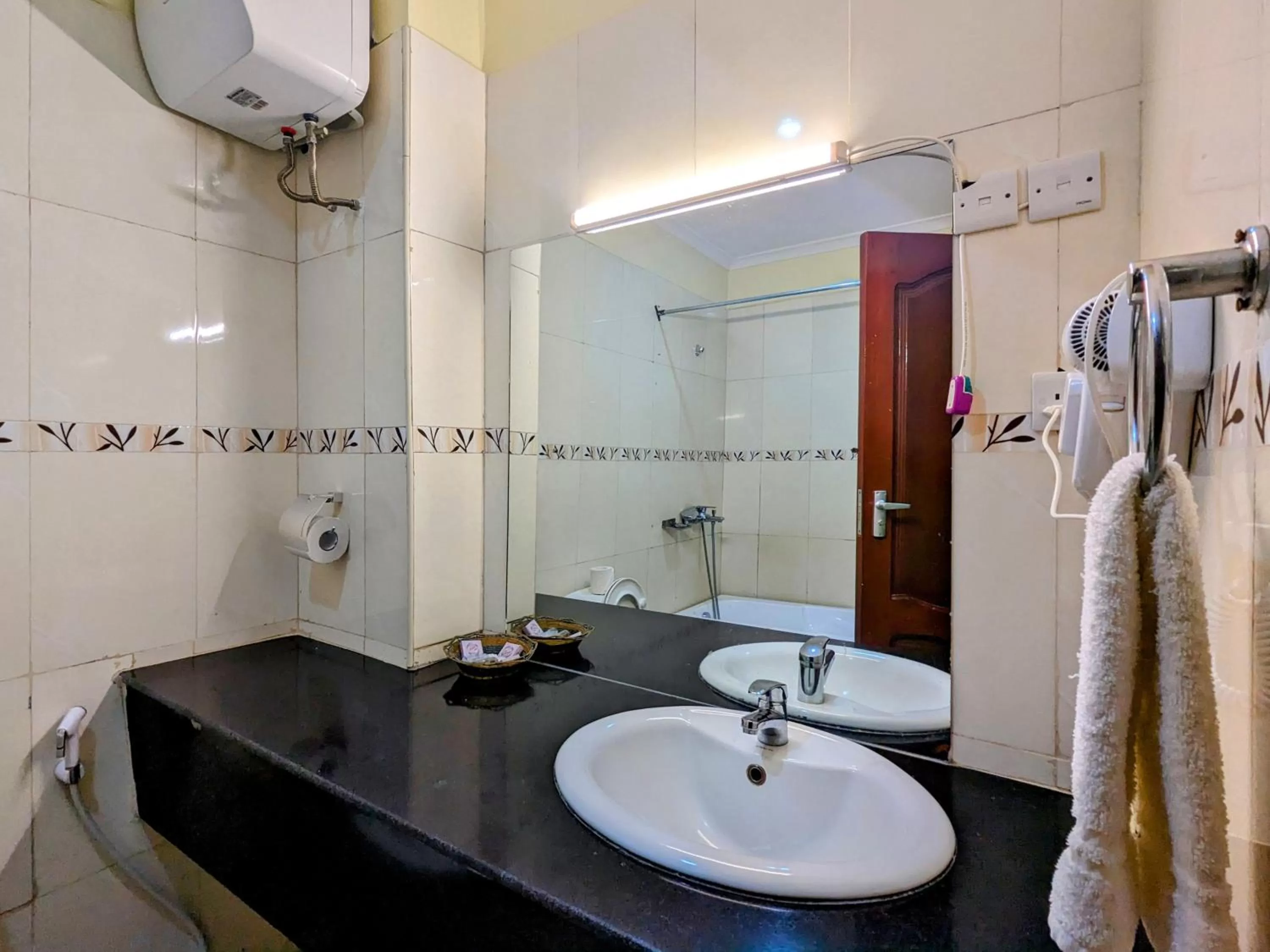 Shower in Mvuli Hotels Arusha
