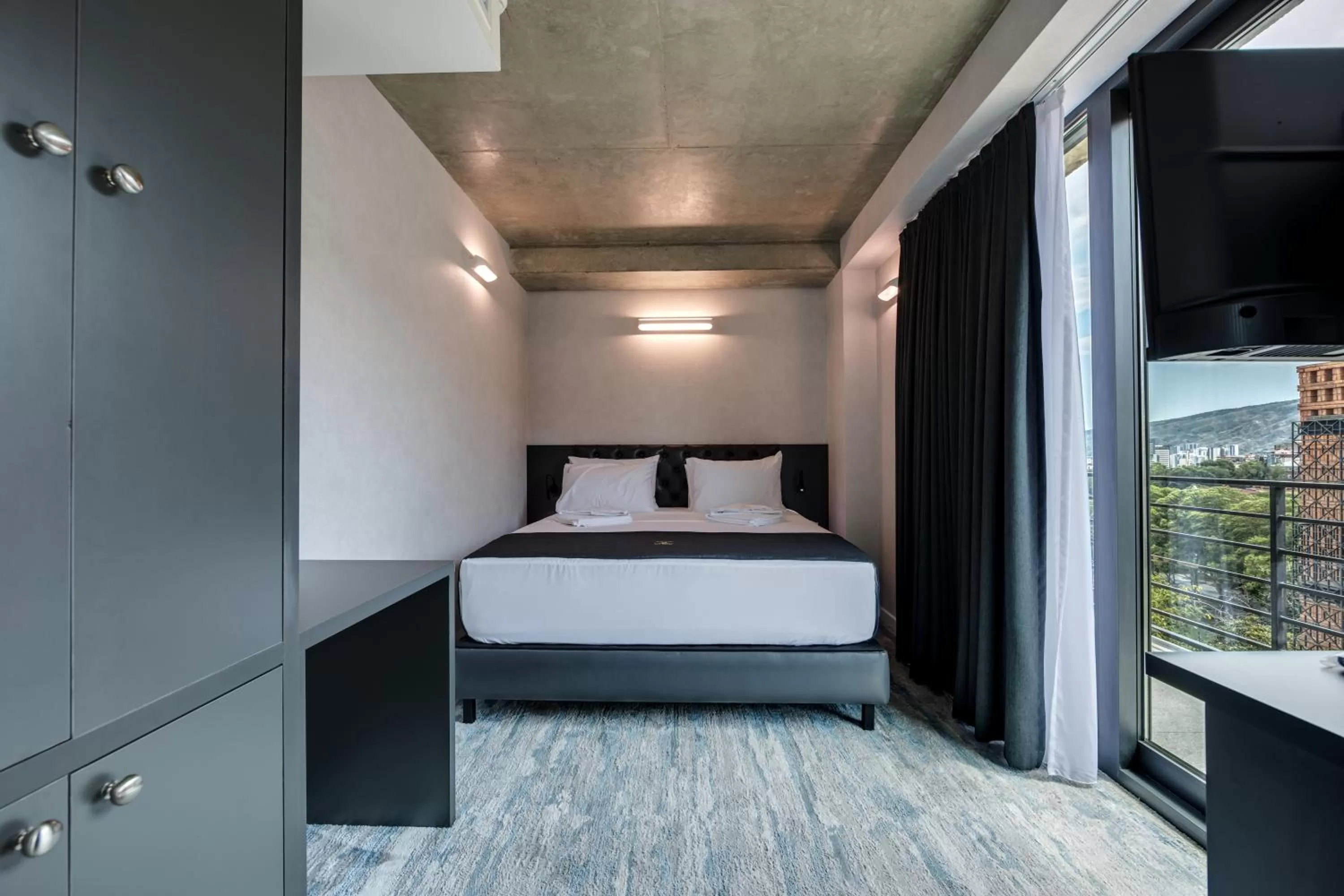 Bed in Mit Hotel Tbilisi