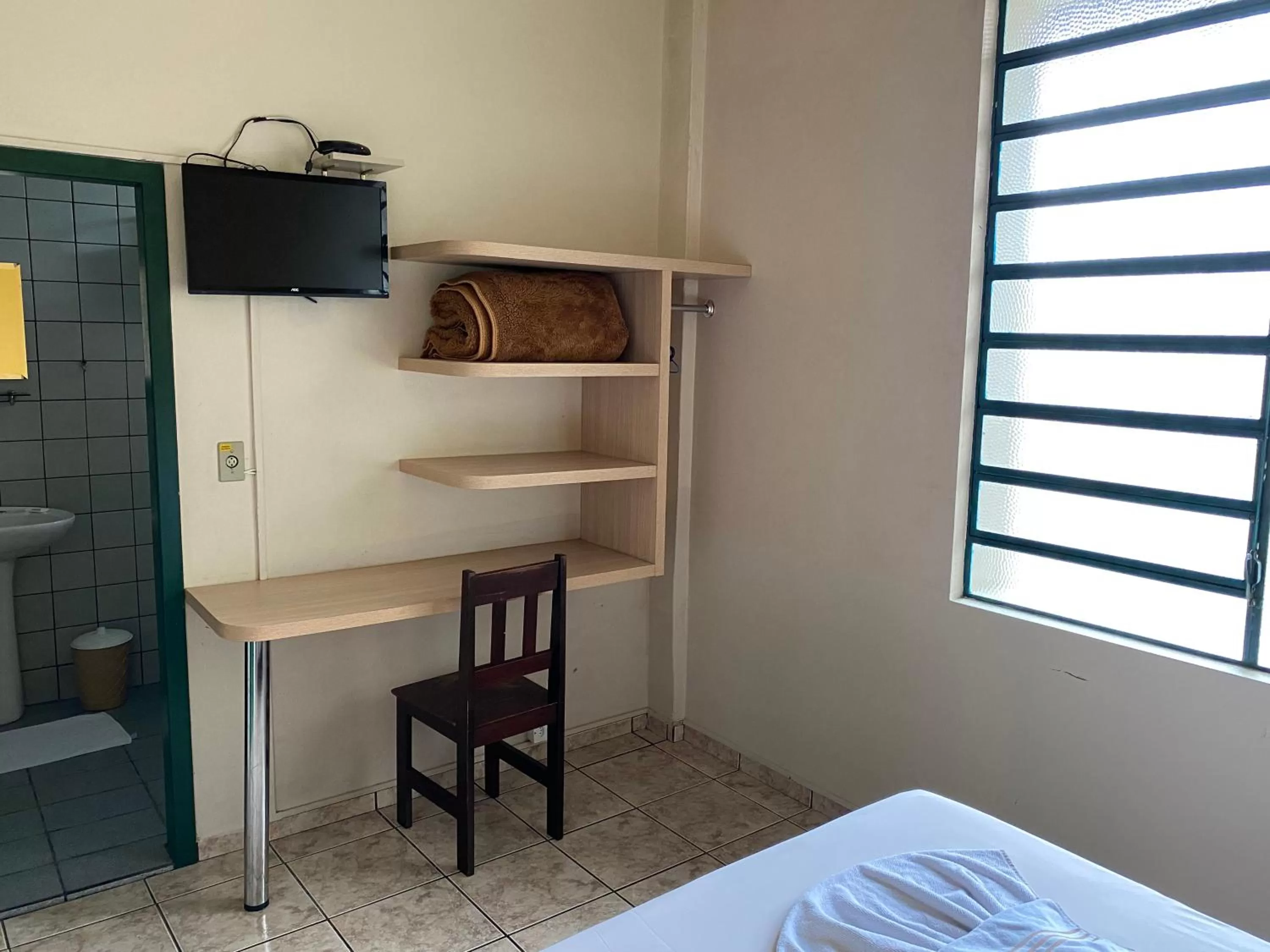 Bedroom, TV/Entertainment Center in Hotel Bavarium