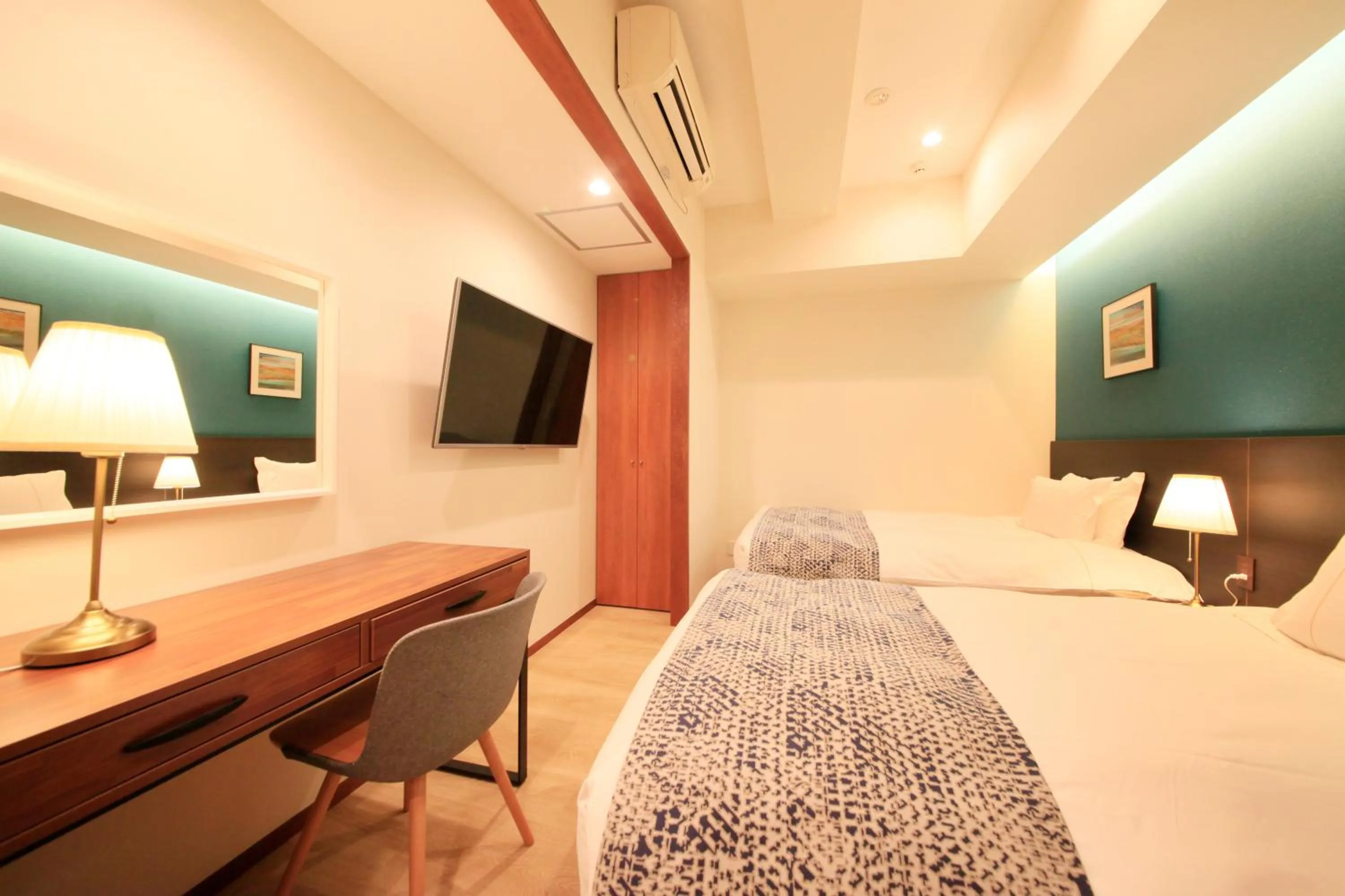 Photo of the whole room, Bed in Centurion Hotel Residential Akasaka Station