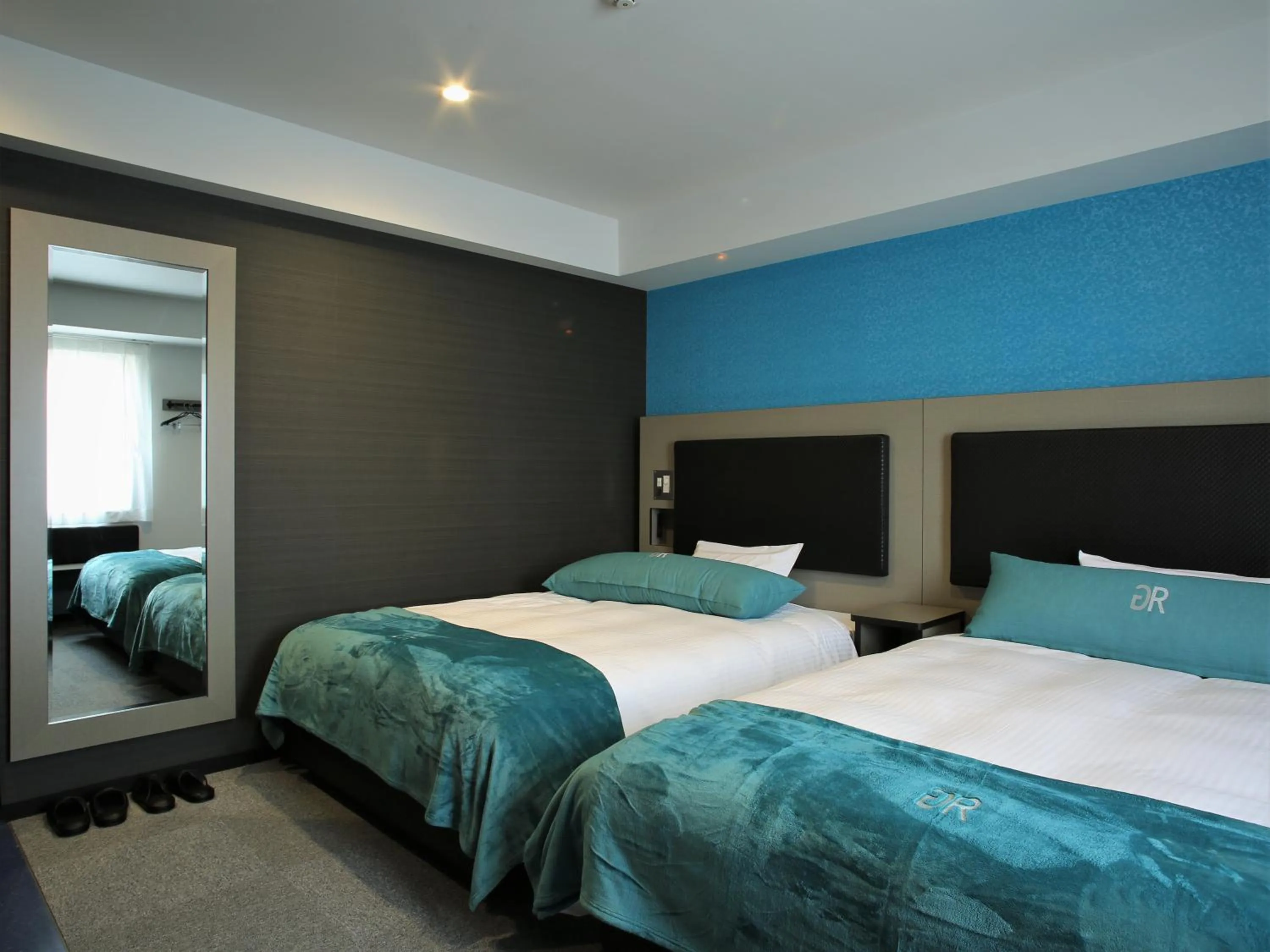 Photo of the whole room, Bed in Green Rich Hotel & Capsule Naha - Artificial hot spring Futamata Yunohana