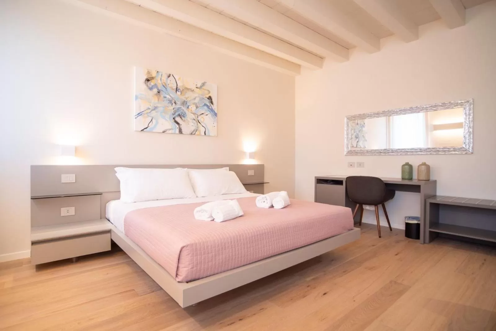 Bed in Maison Calcirelli rooms