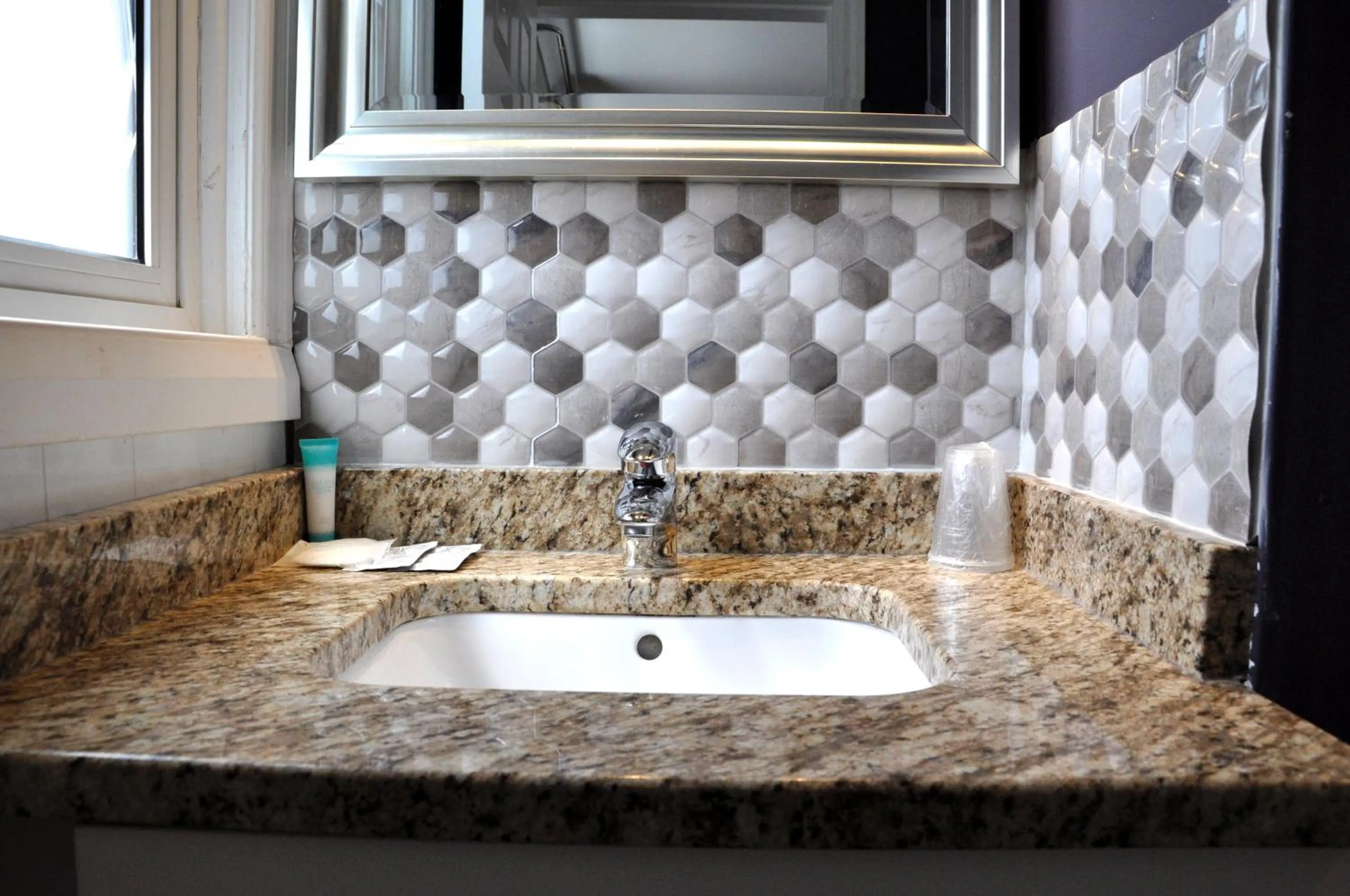 Bathroom in Moonlight Inn and Suites Sudbury