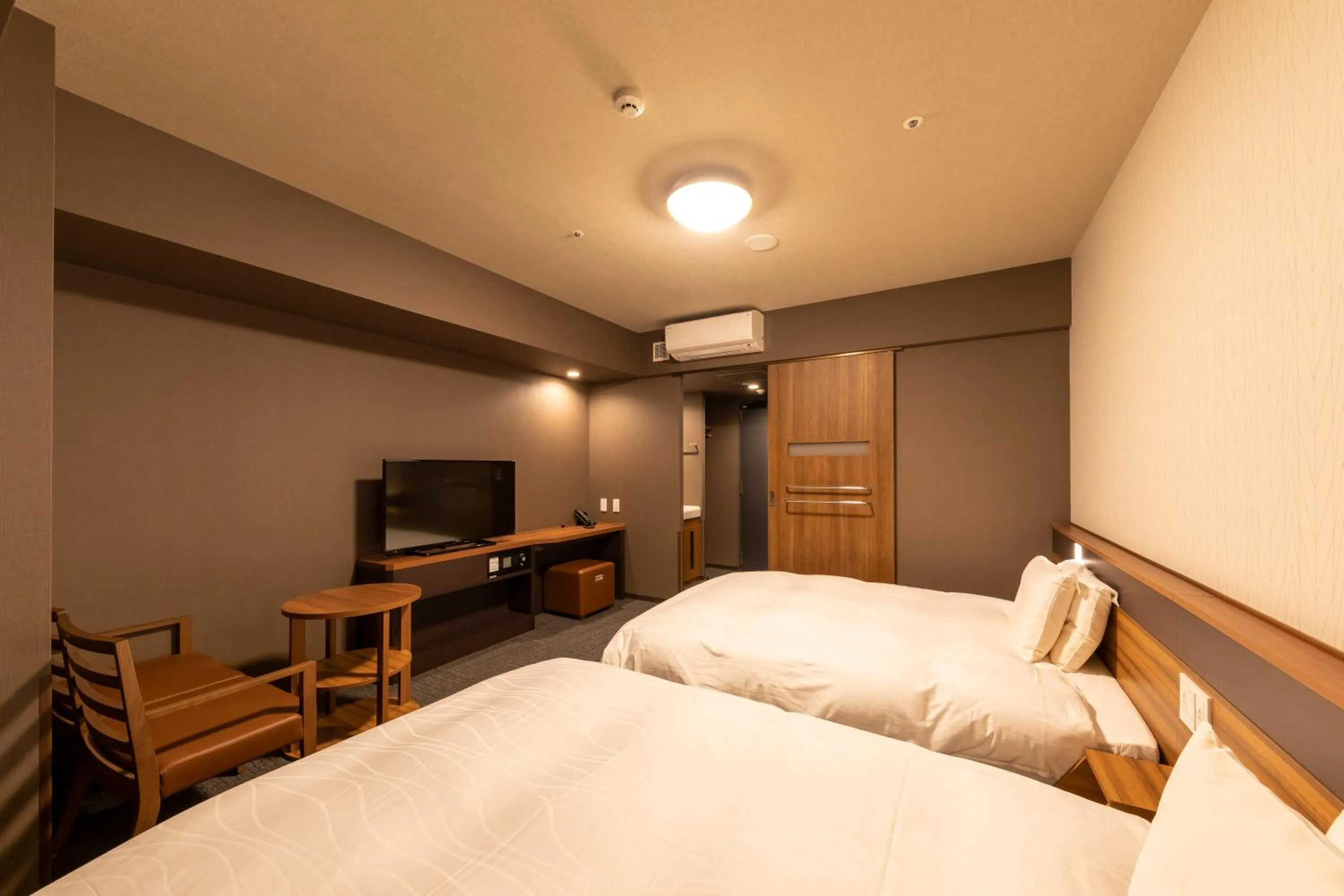 Bed in Dormy Inn Kawasaki Natural Hot Spring