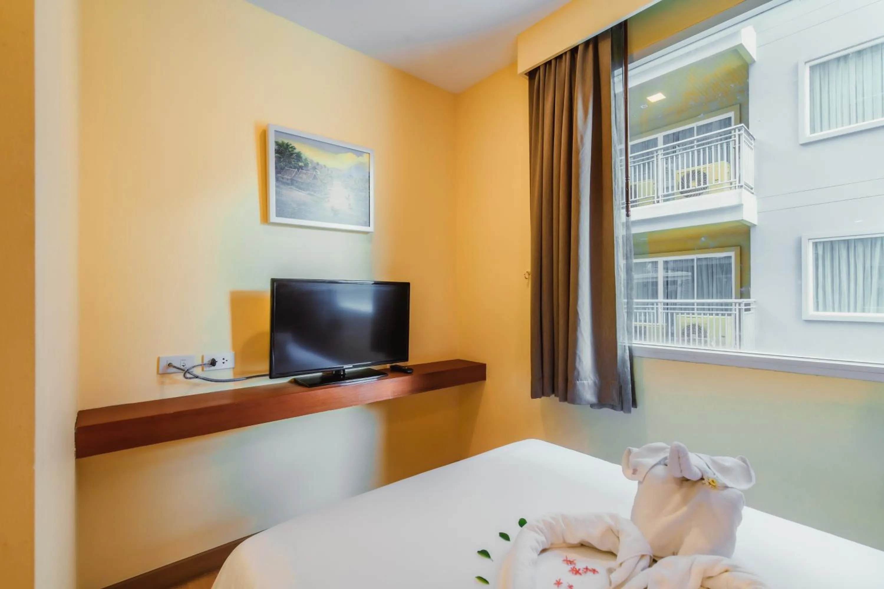 TV and multimedia, Bed in Elite Suites Patong