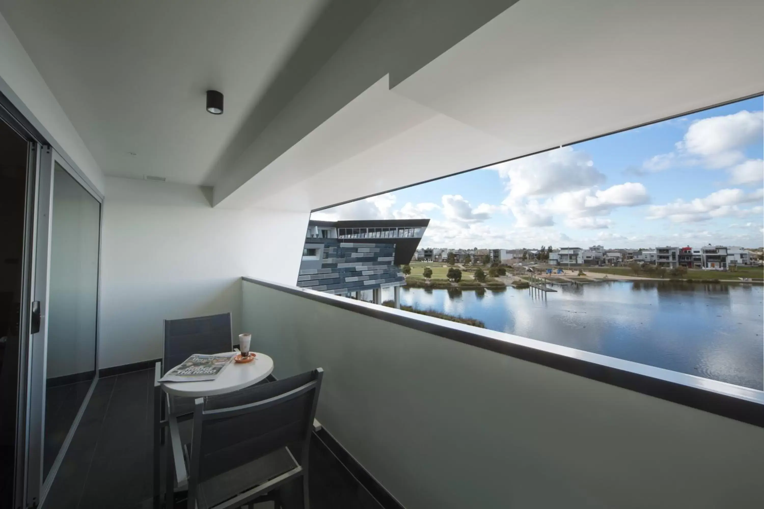 Superior King Room with Balcony and Lake View in Mercure Melbourne Caroline Springs Superior King Room with Balcony and Lake View in Mercure Melbourne Caroline Springs