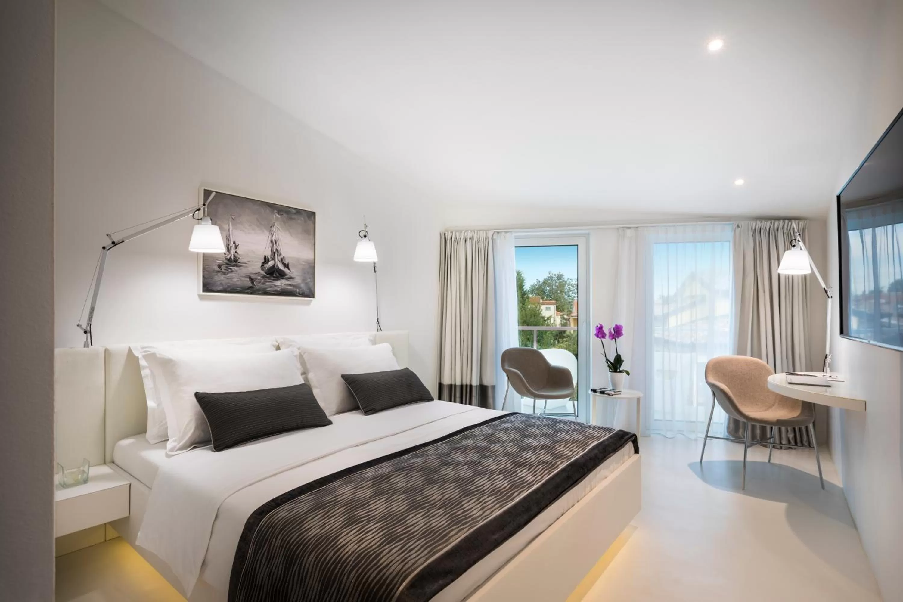 Balcony/Terrace, Bed in RIVALMARE BEACH Boutique Hotel