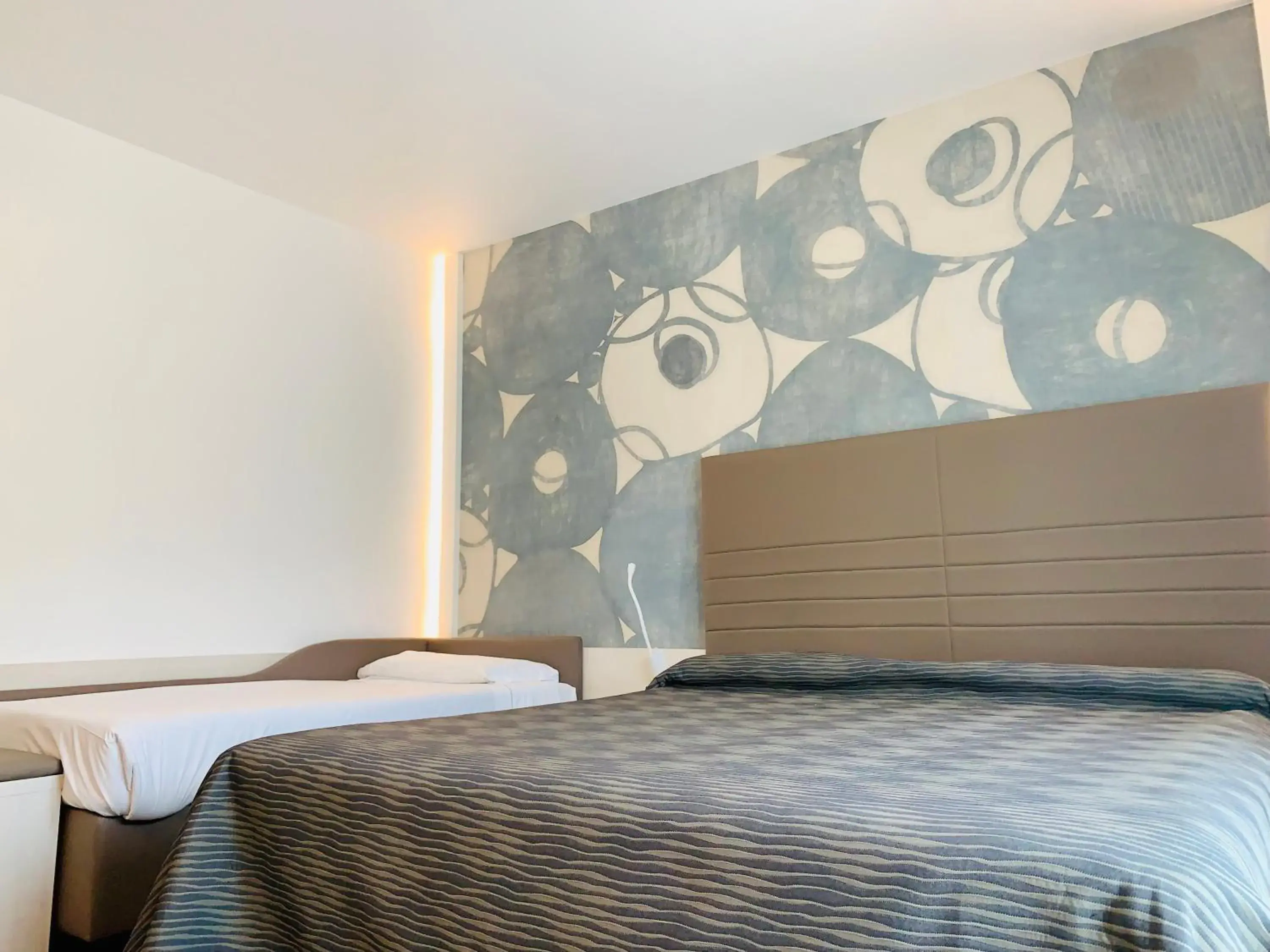 Comfort Triple Room with Garden View in Hotel Campagnola Comfort Triple Room with Garden View in Hotel Campagnola