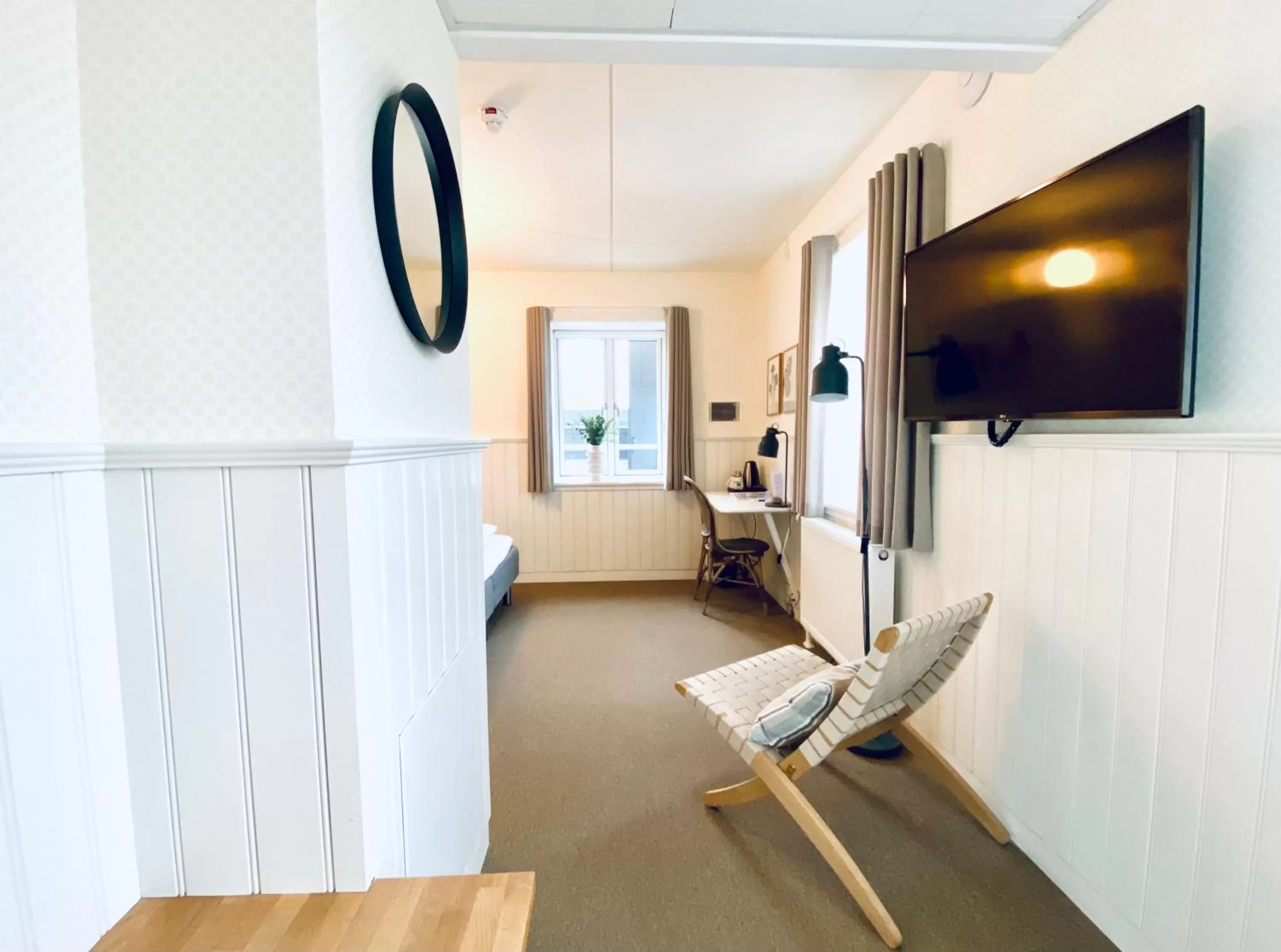 Communal lounge/ TV room in Hotel Marie