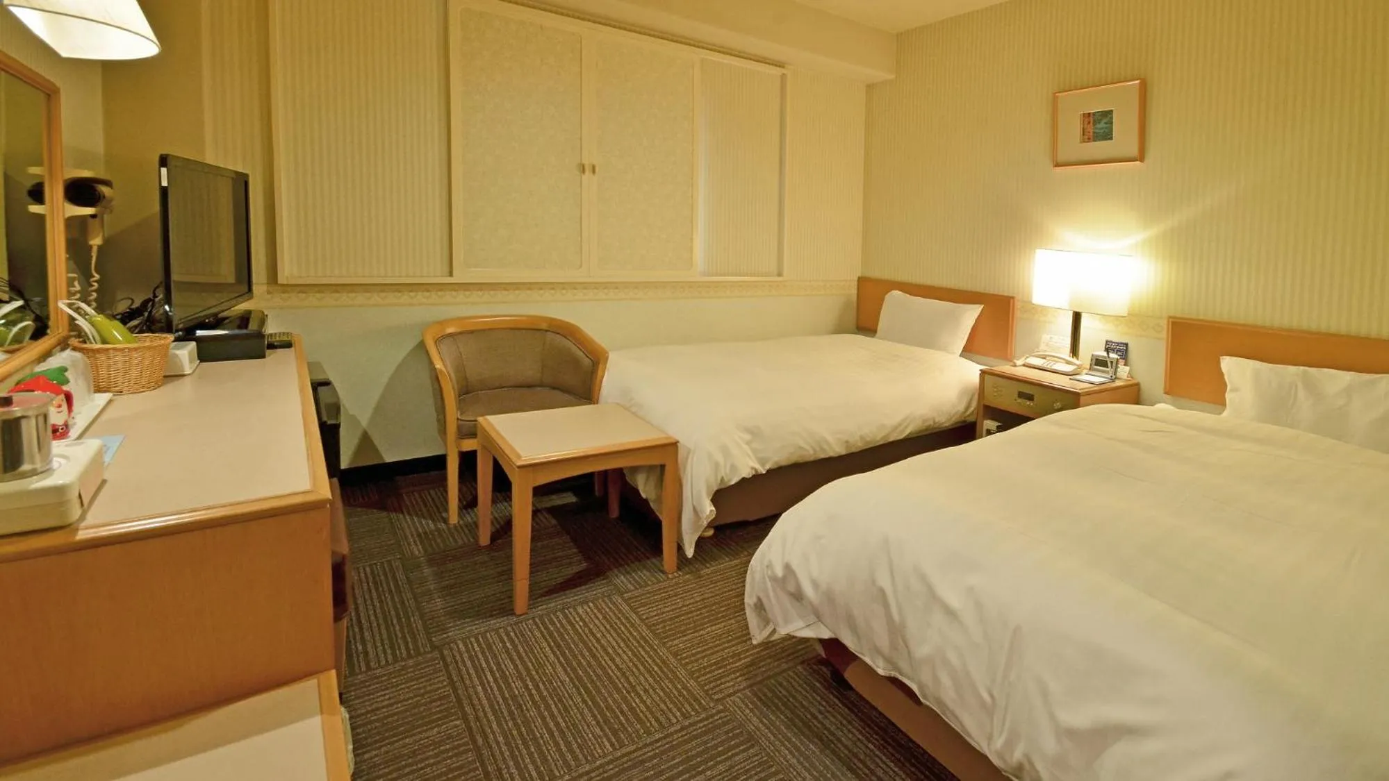 Photo of the whole room, Bed in Omura Central Hotel