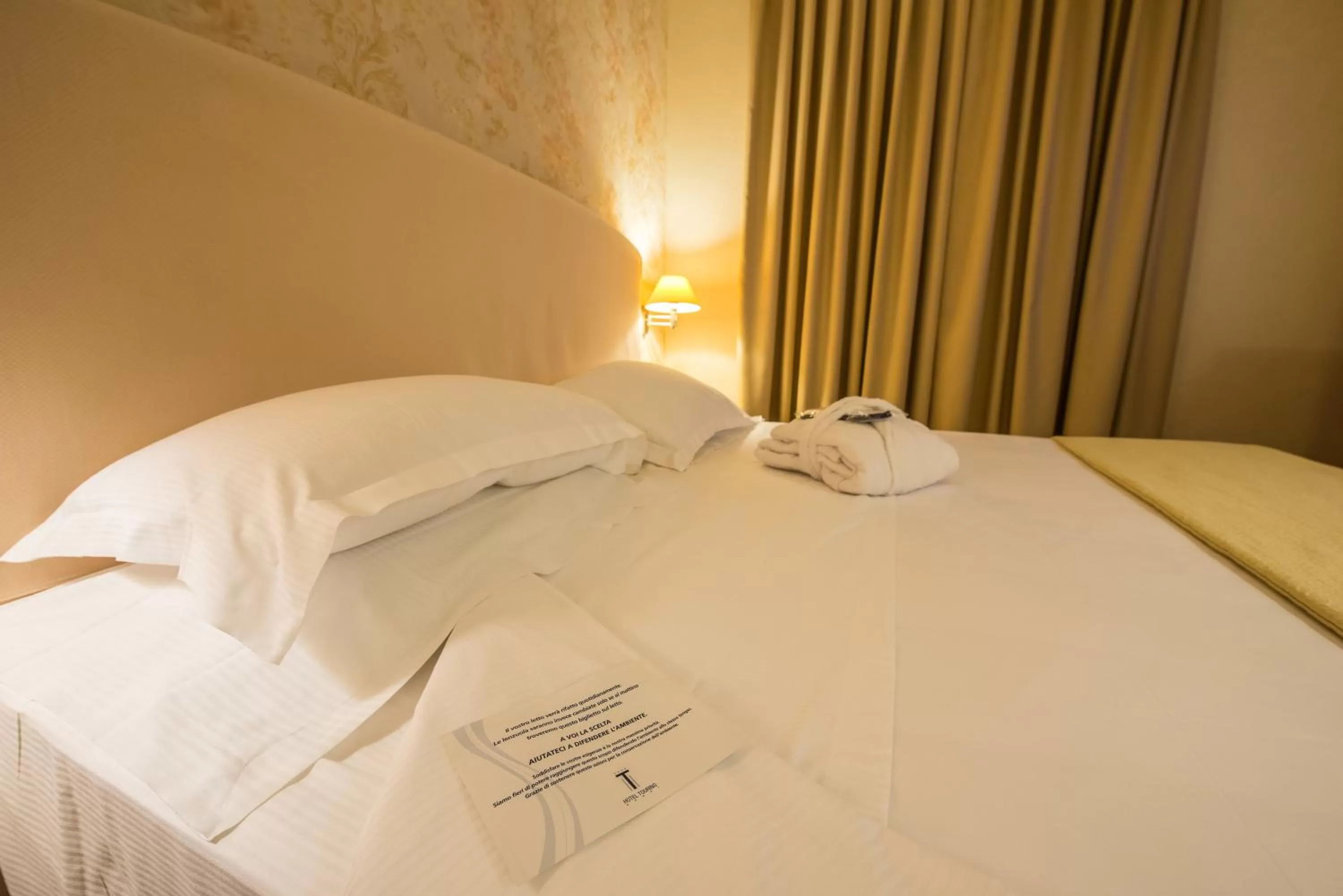 Bed in Hotel Touring