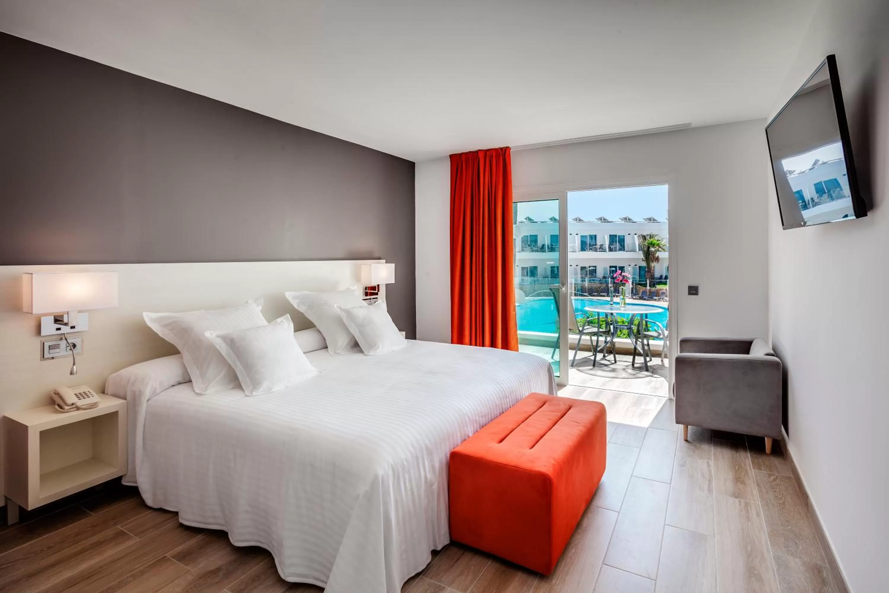 Photo of the whole room, Bed in Barceló Corralejo Sands