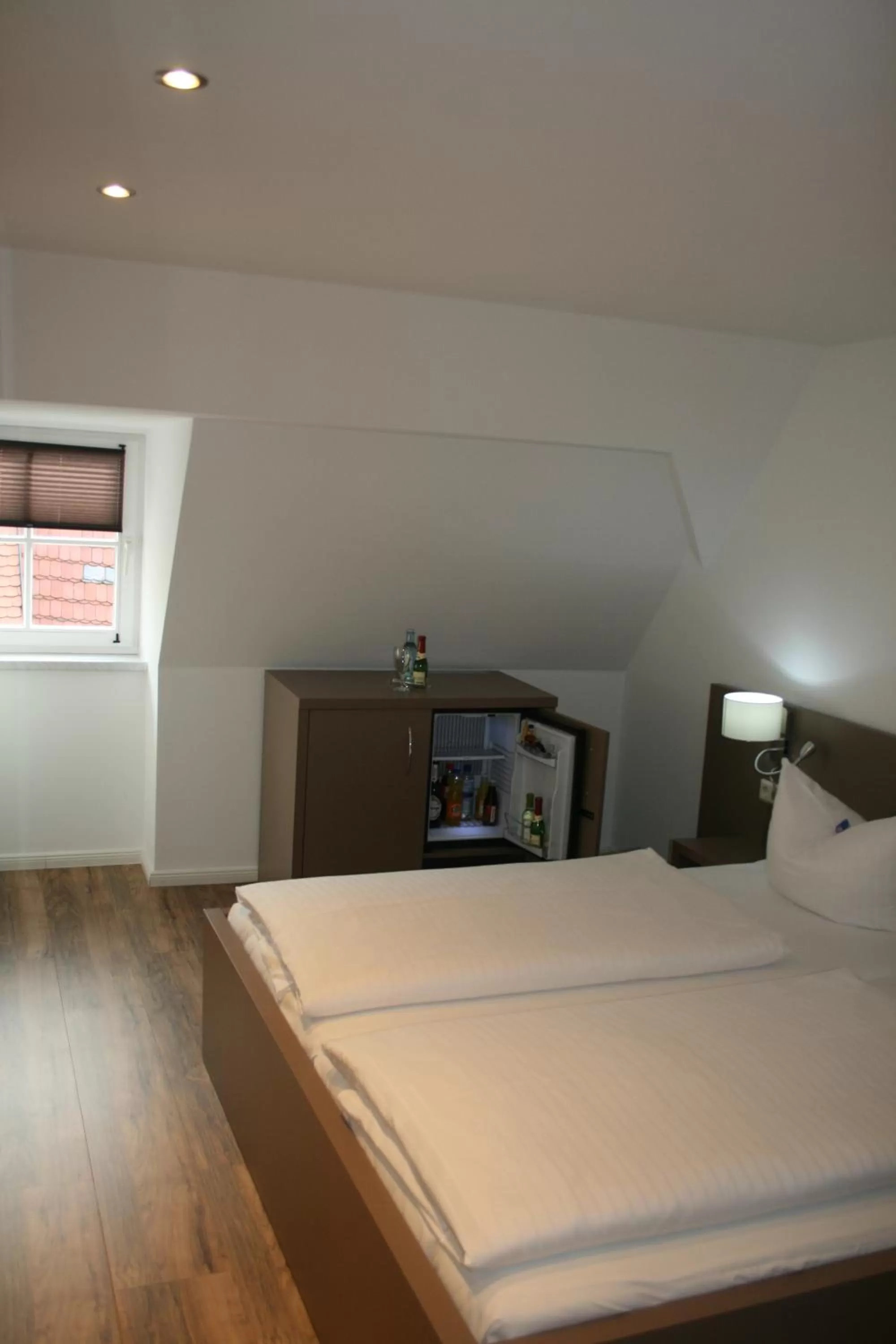 Photo of the whole room, Bed in Hotel Am Obermarkt