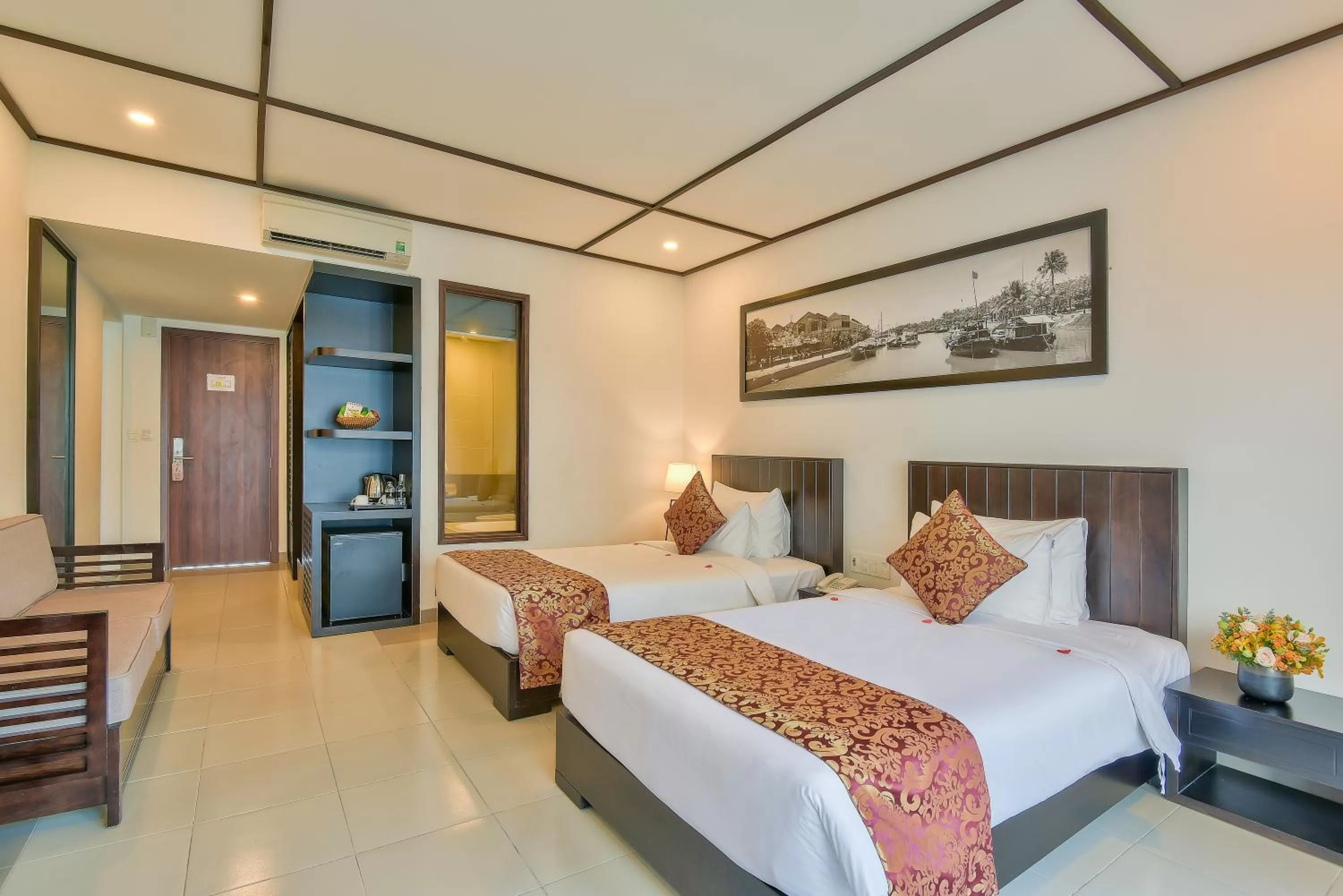 Junior Suite Twin with Balcony and Pool View in Golden Pearl Hoi An Hotel