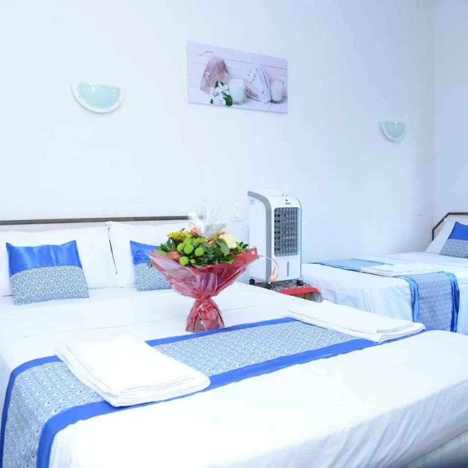 Bedroom in Hôtel Aux Armes de Belgique