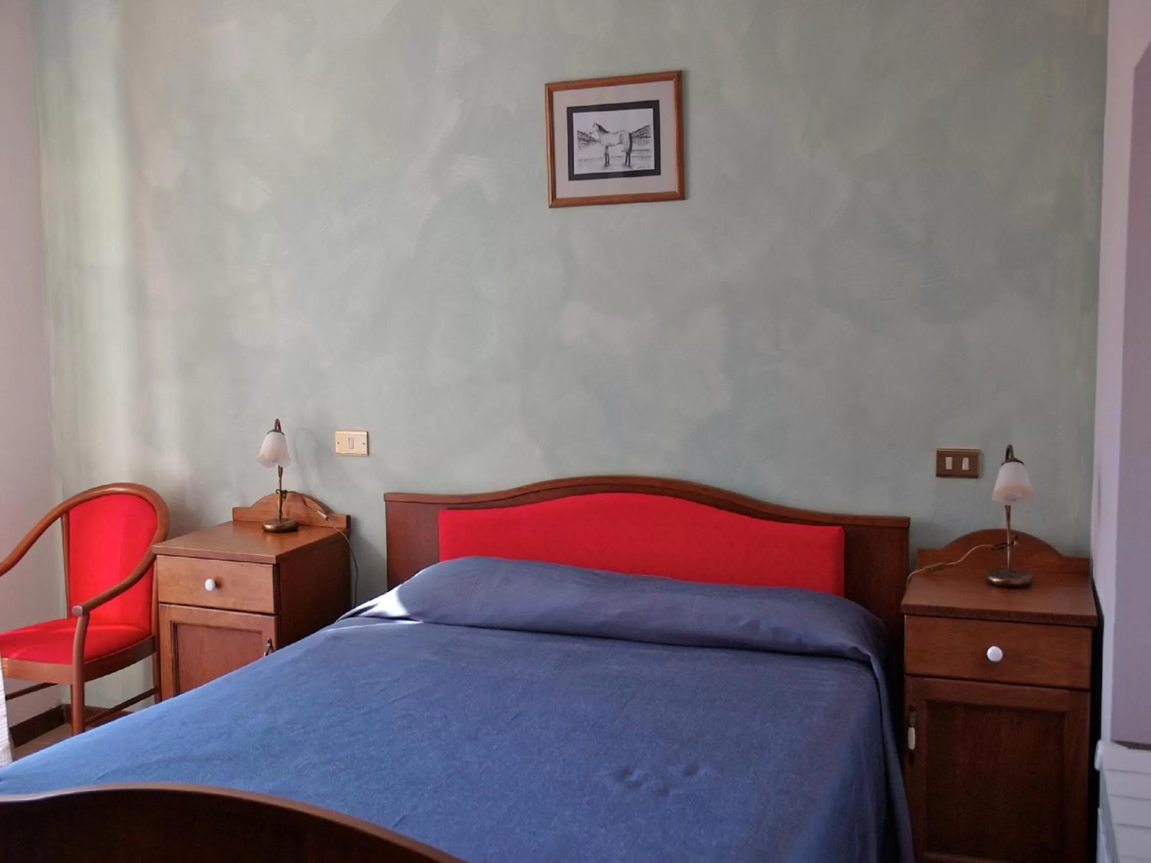 Bed in Albergo Miramonti
