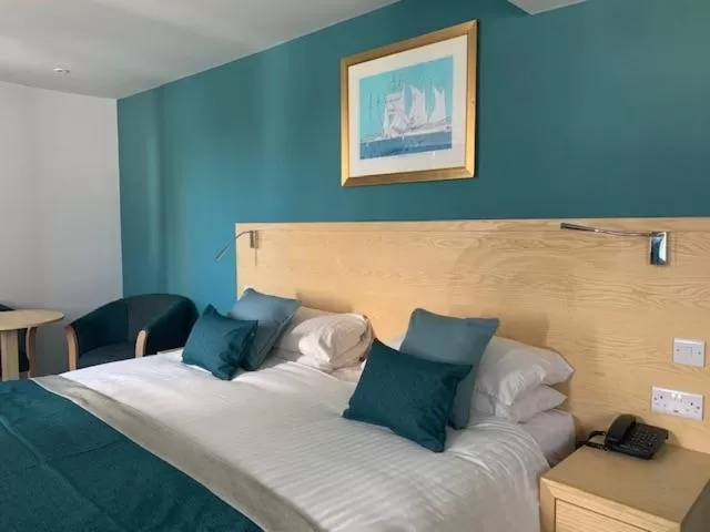 Bed in Royal Maritime Hotel