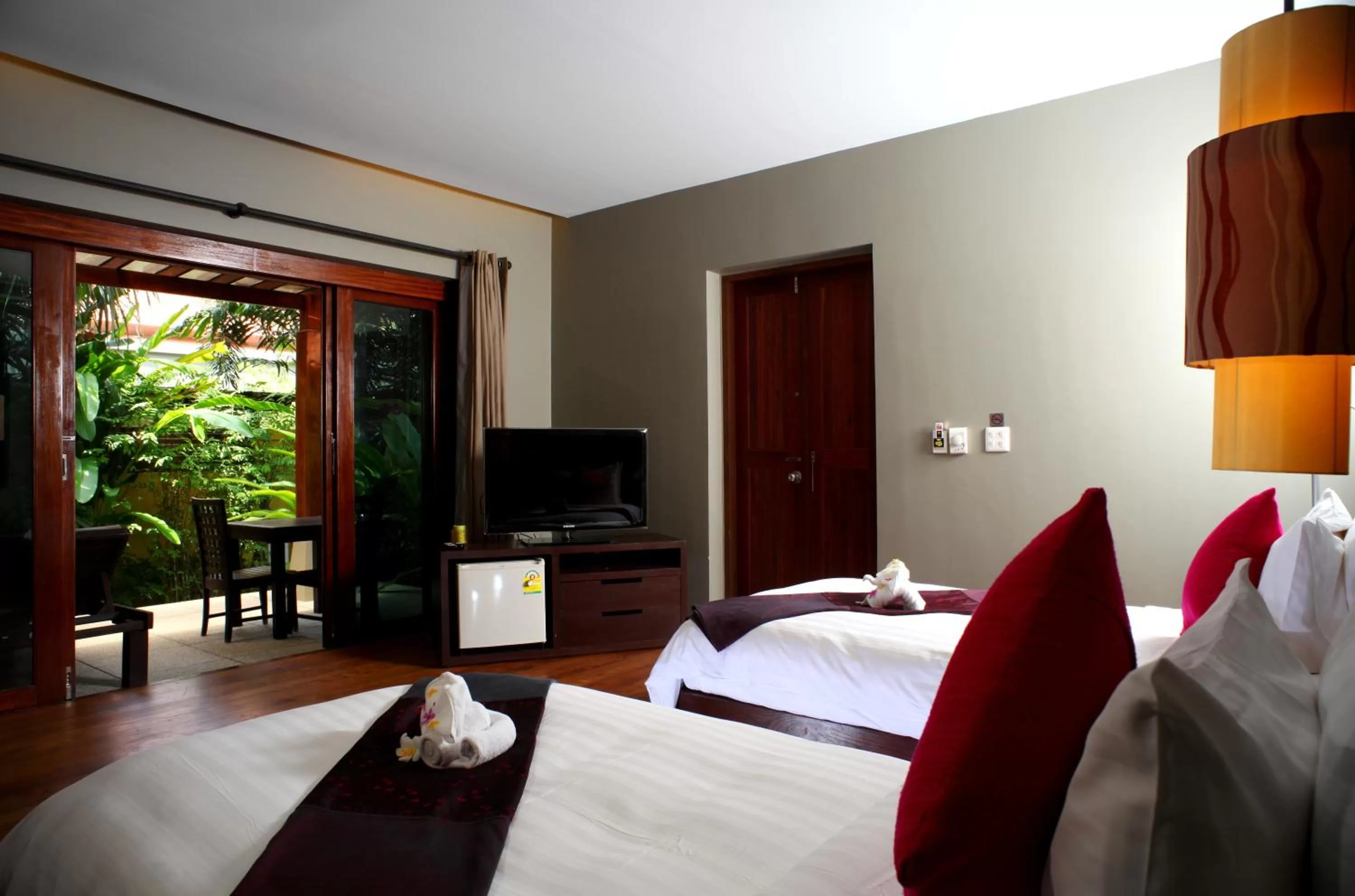 Bed in Chongfah Resort Khao Lak - SHA Extra Plus