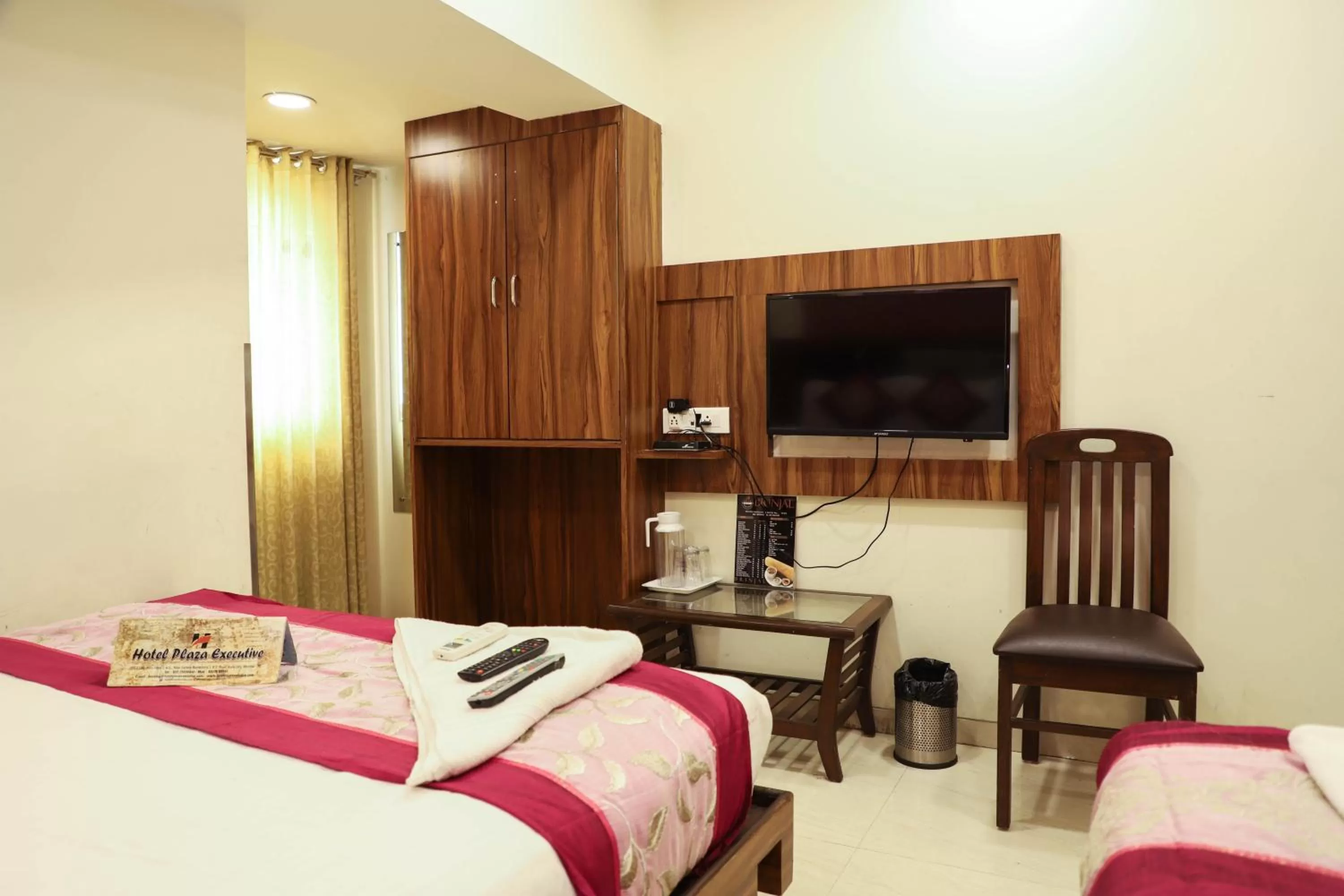 Communal lounge/ TV room, Bed in Hotel Plaza Executive - near BKC