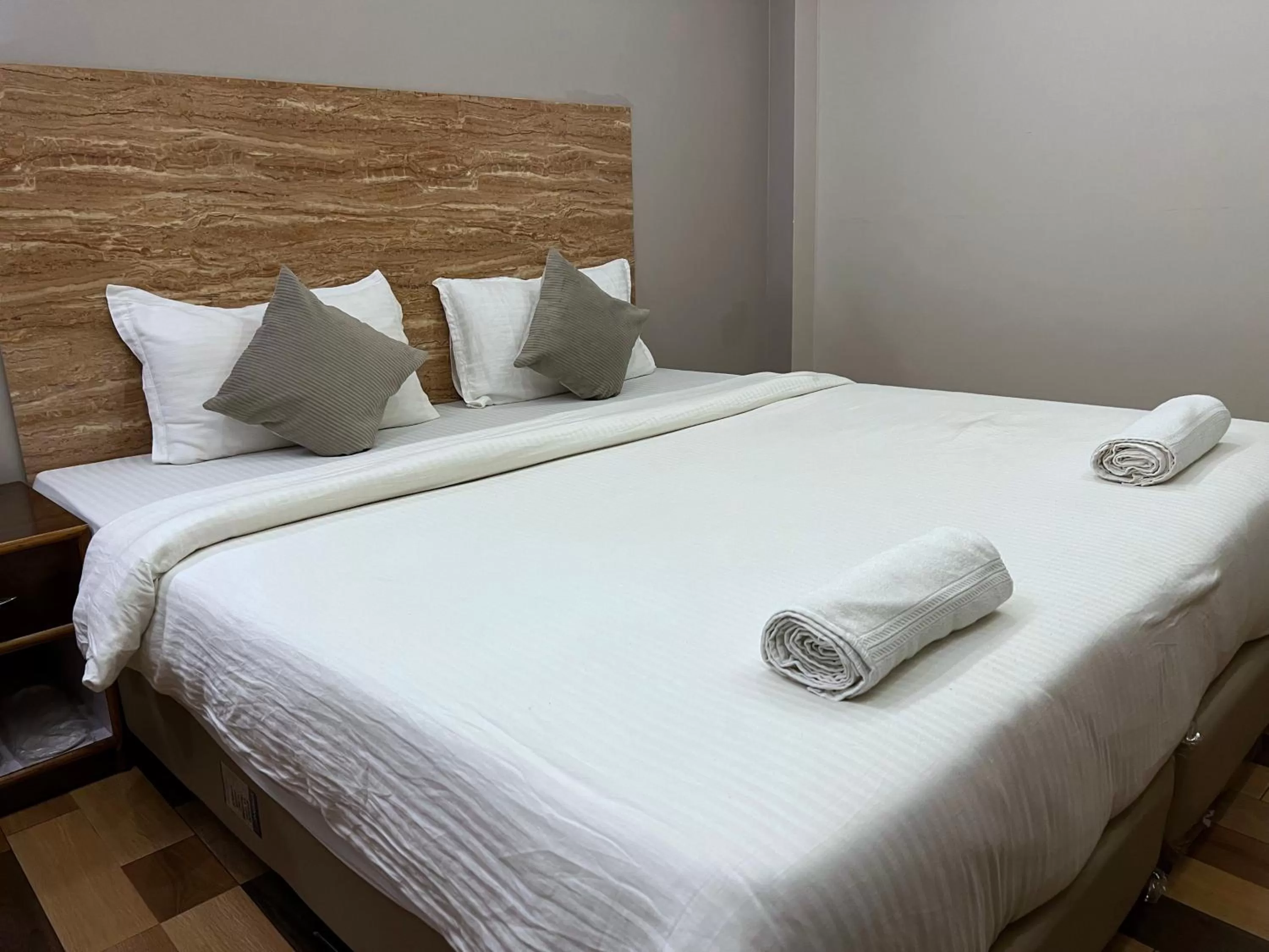 Bed in The Phoenix Residency