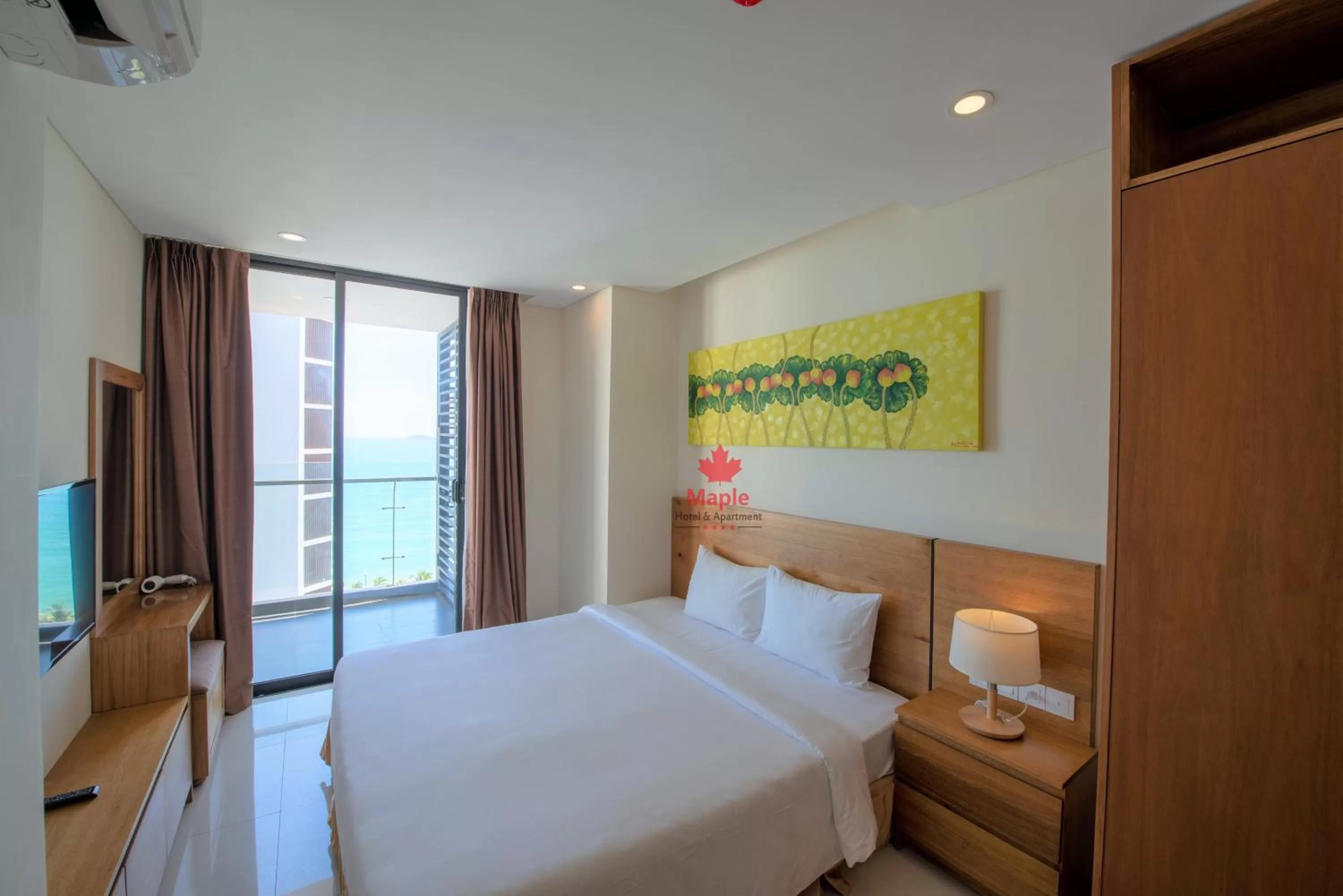 Bed in Maple Hotel & Apartment