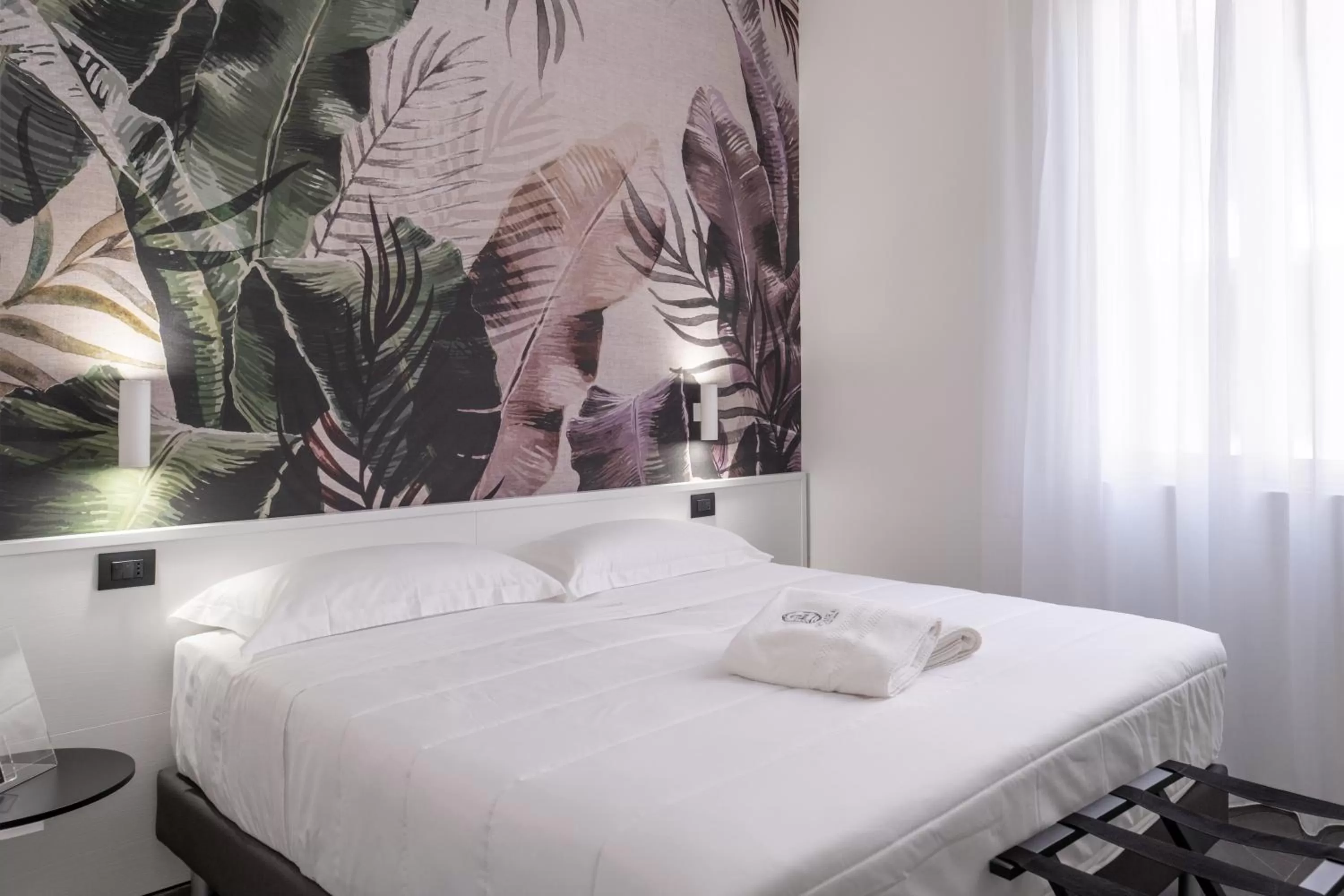 Bed in Domea Superior Rooms Bed and Breakfast