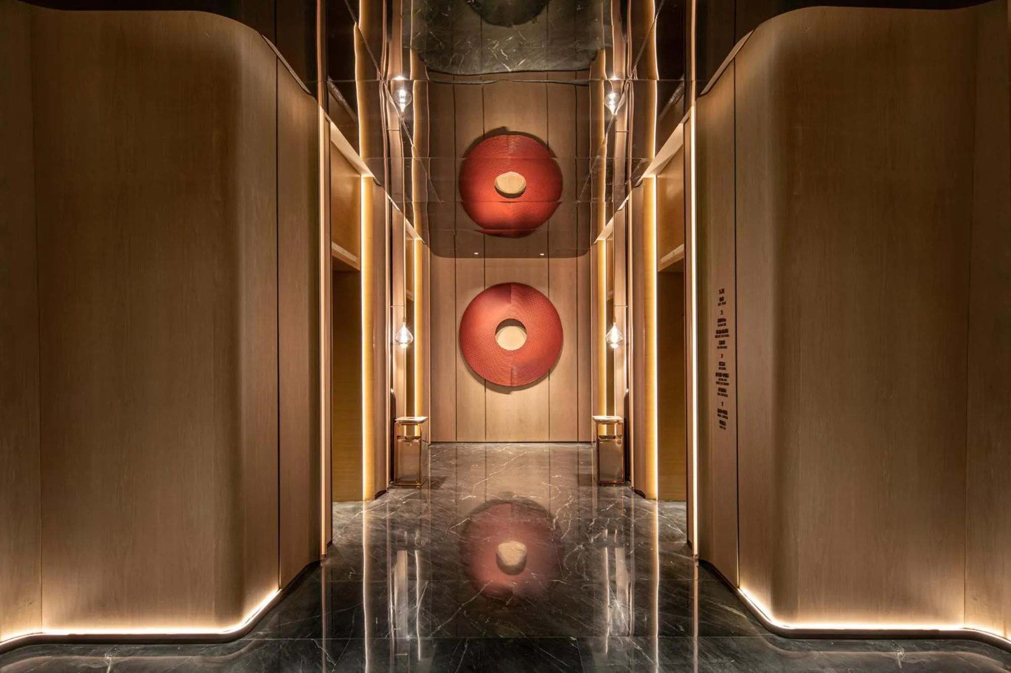 elevator in HUALUXE Shanghai Changfeng Park by IHG
