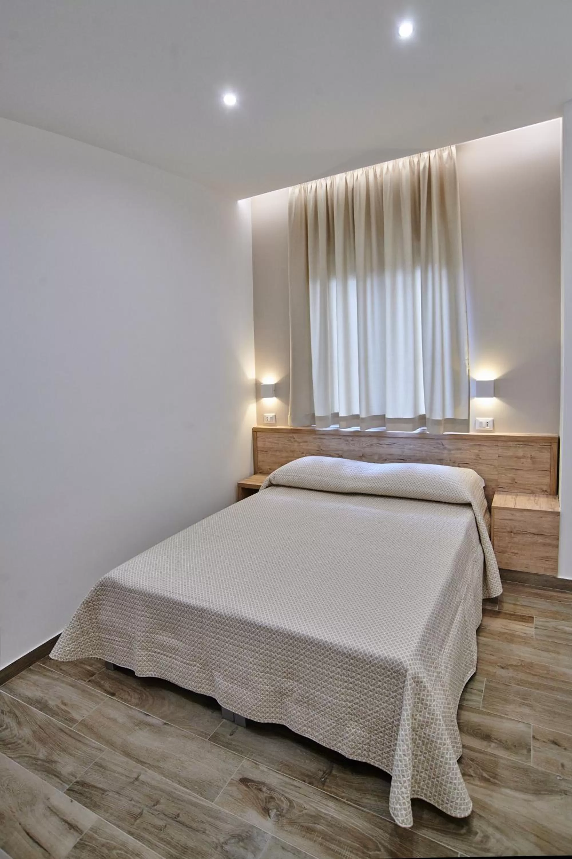 Bed in B&B Giglio di mare