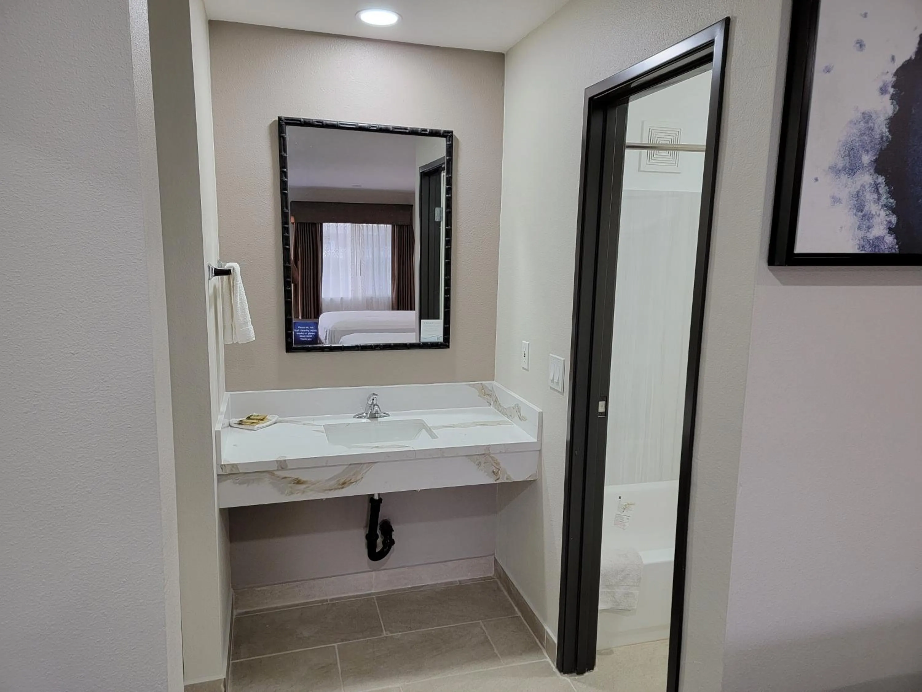 Bathroom in Travelodge by Wyndham Buena Park