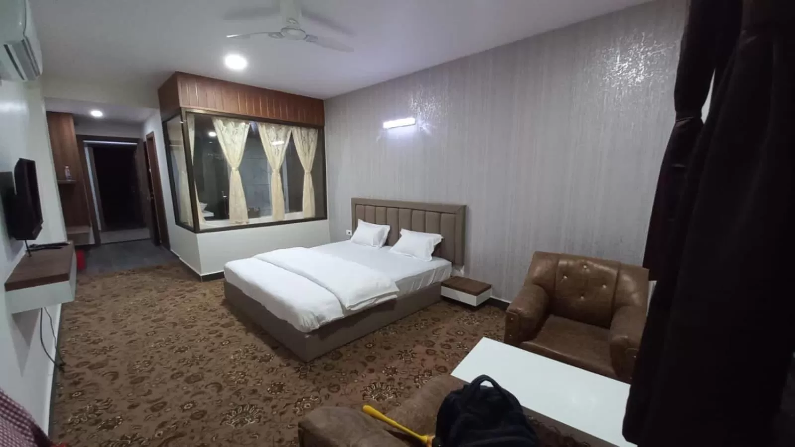 Photo of the whole room, Bed in Hotel Jurkis, Kolhapur