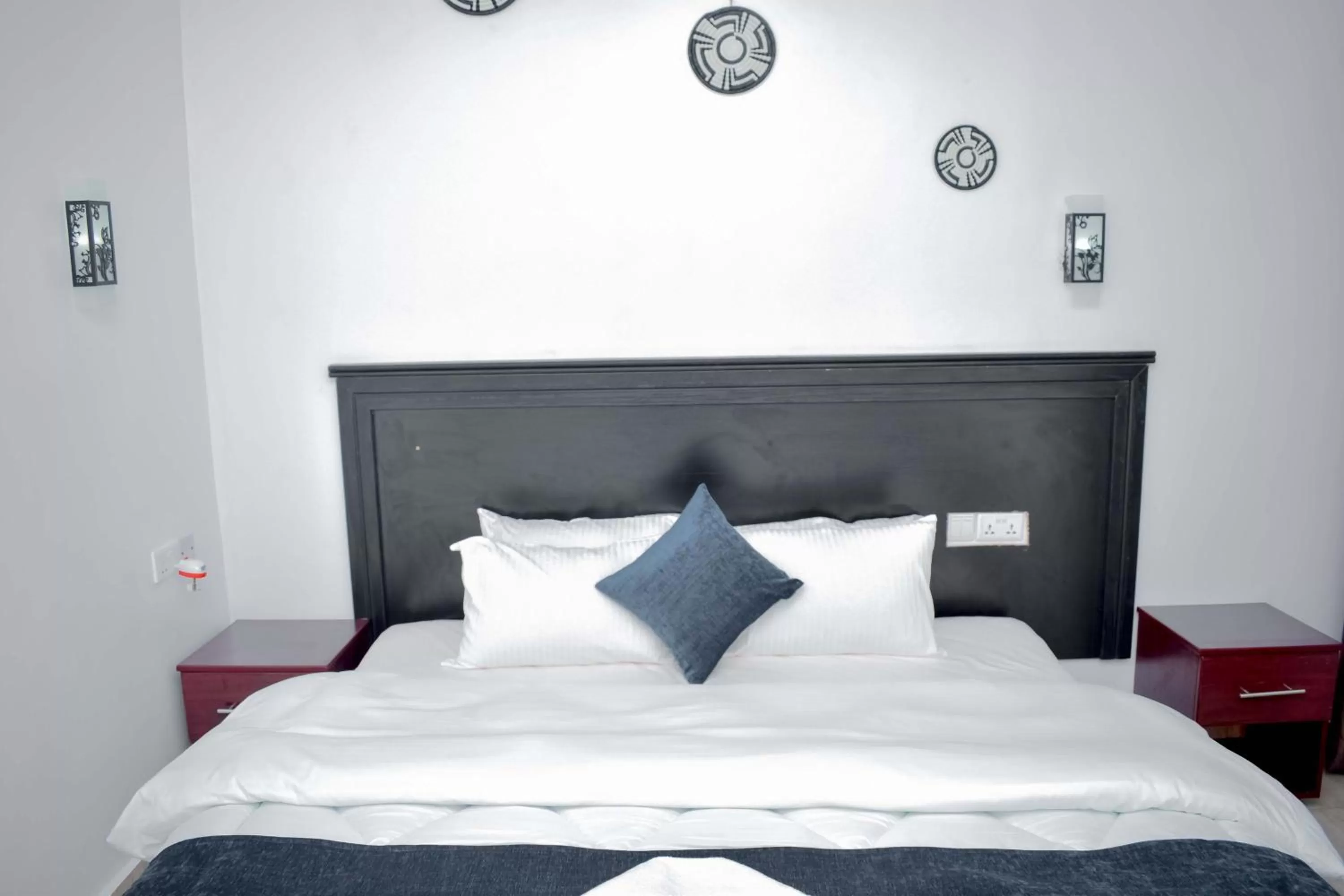 Bed in INZOZI AFRICA HOUSE B&B-Gishushu