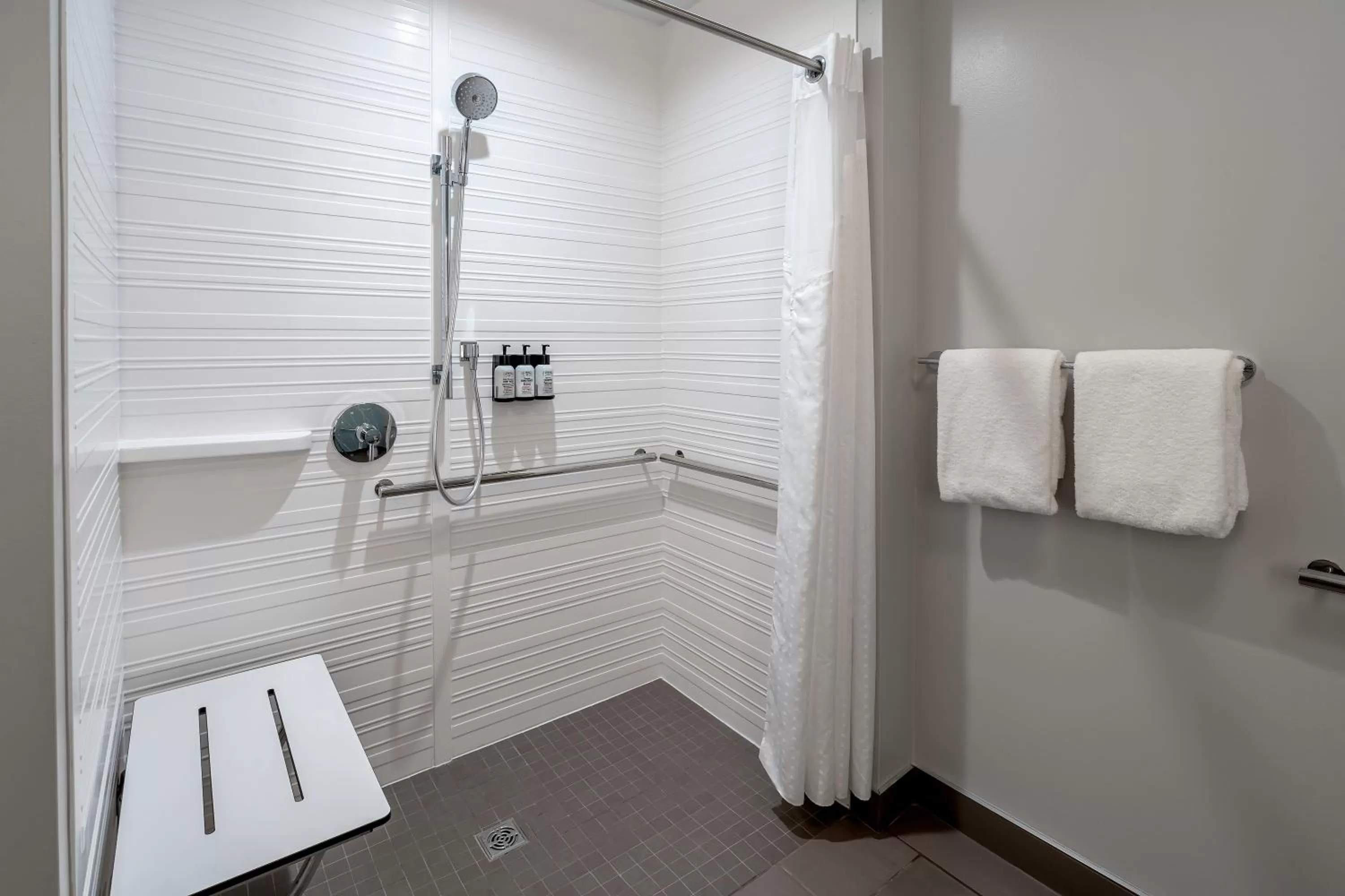 Bathroom in avid hotels Milwaukee West - Waukesha by IHG