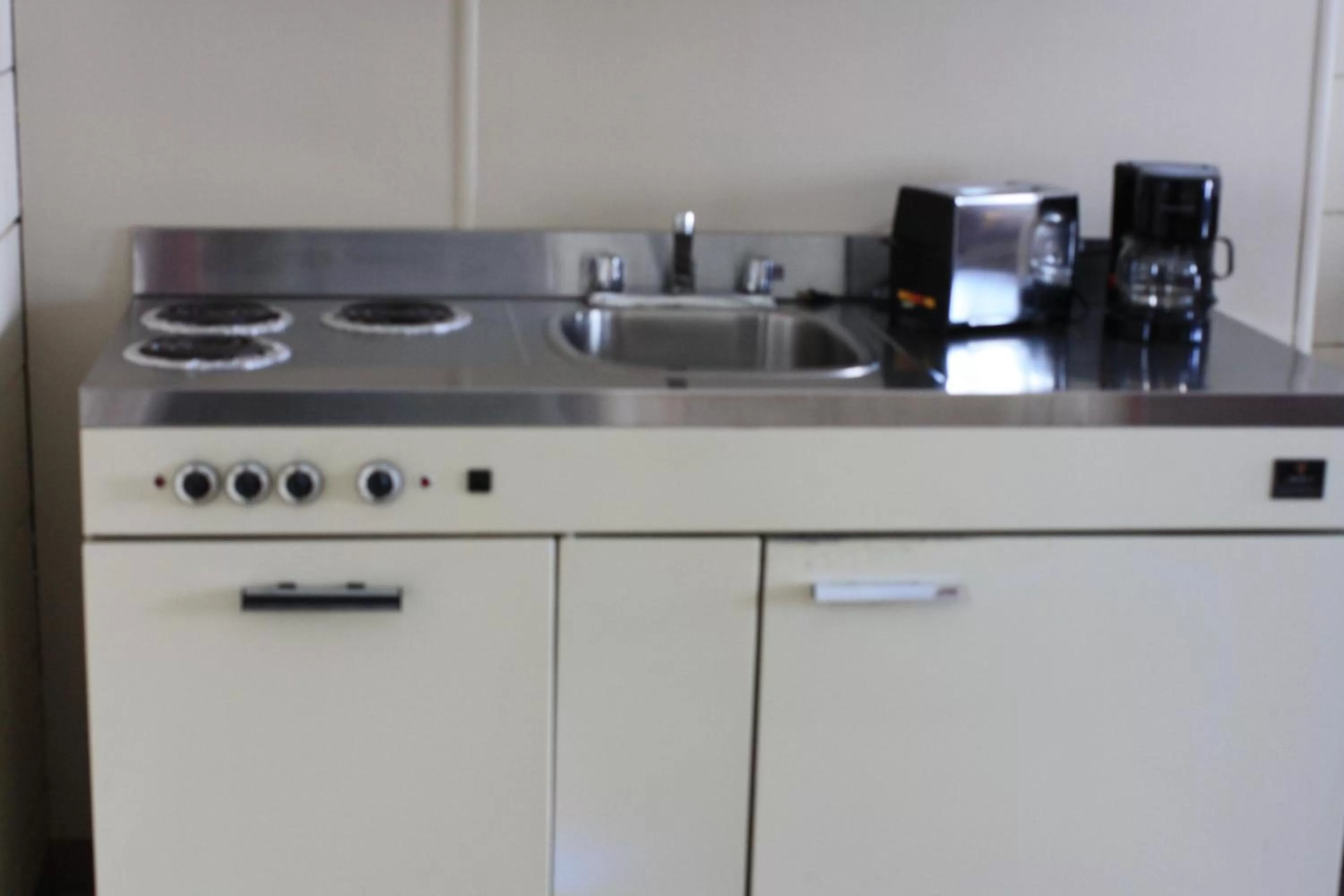 Kitchen or kitchenette in Plains Motel