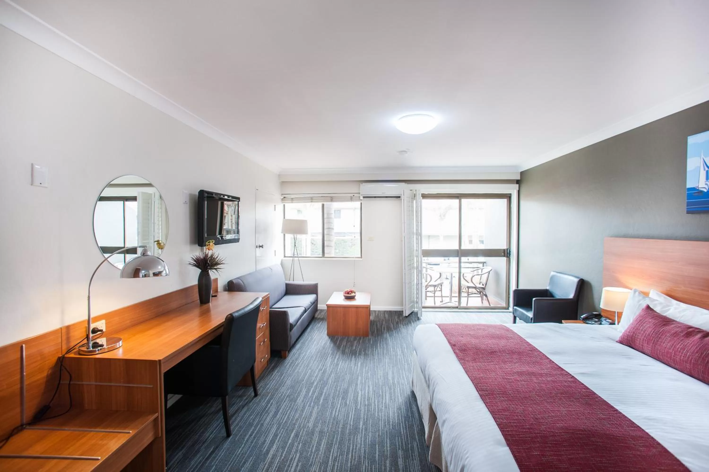 Photo of the whole room, Bed in Ramada Hotel & Suites by Wyndham Cabramatta