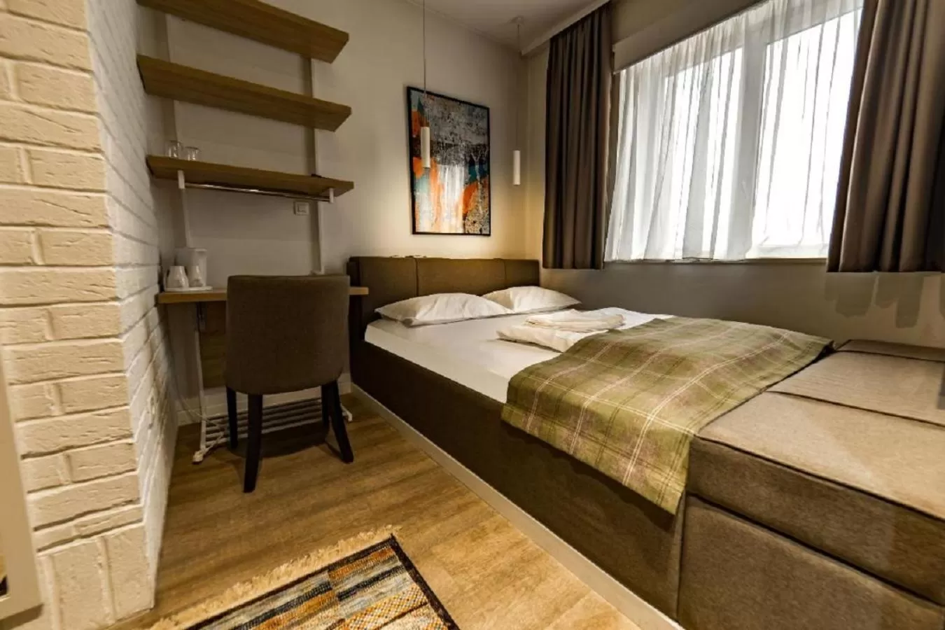 Bed in Belgrade Inn Garni Hotel