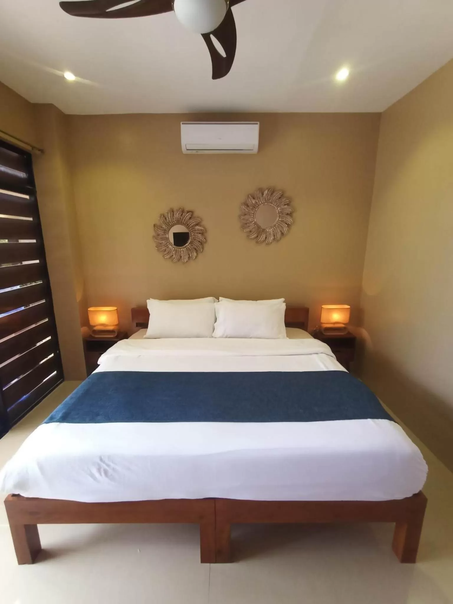 Bed in Southseas Beach Resort and Dive Center